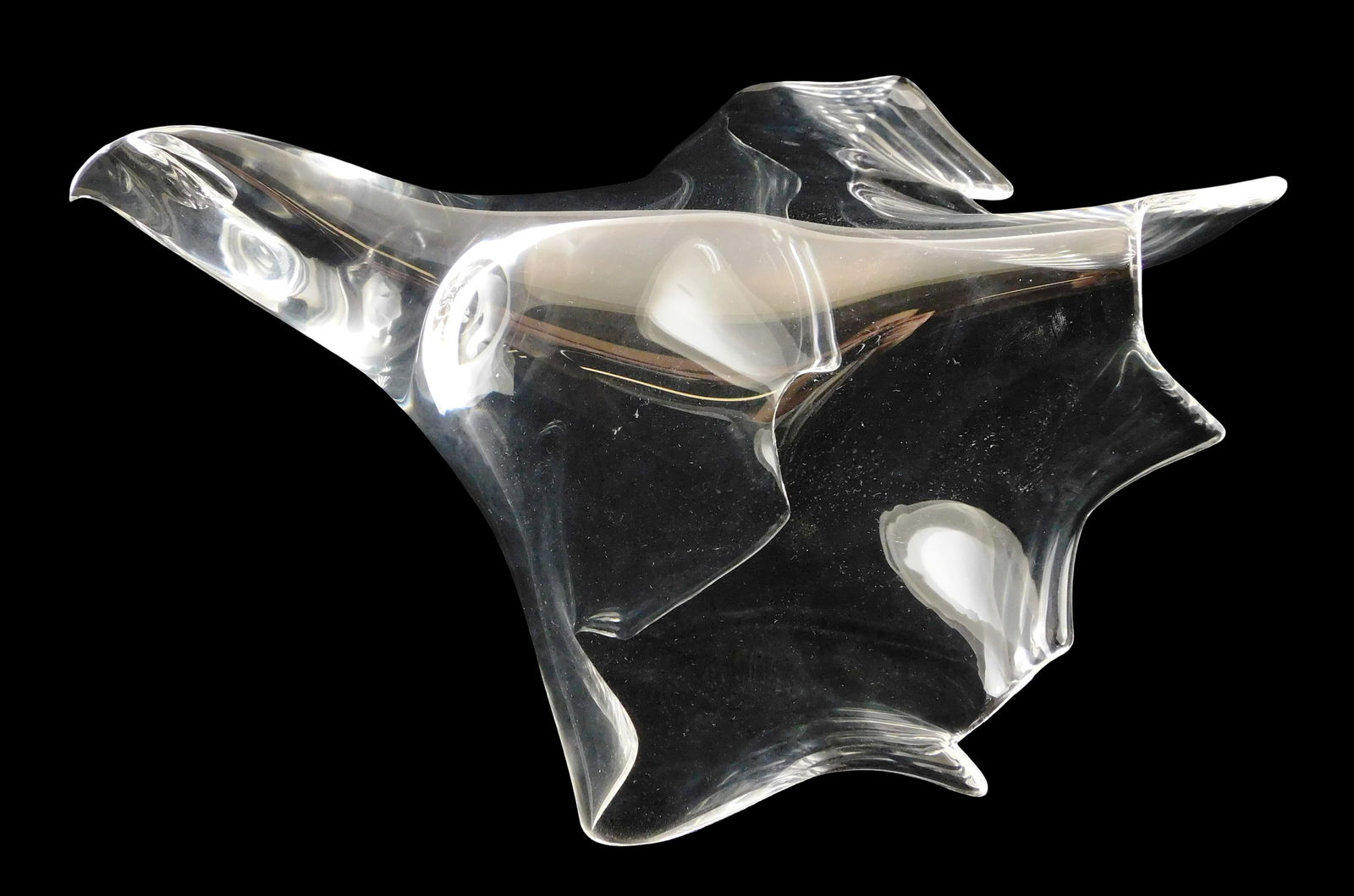 ART GLASS: Steuben “Flying Eagle?? crystal sculpture, designed by Paul Schulze, 1975, signed: ART GLASS: Steuben "Flying Eagle" crystal sculpture, designed by Paul Schulze, 1975, signed "Steuben", colorless, large blown form with a cut end to form the eagle's face, sheared edges with one creat