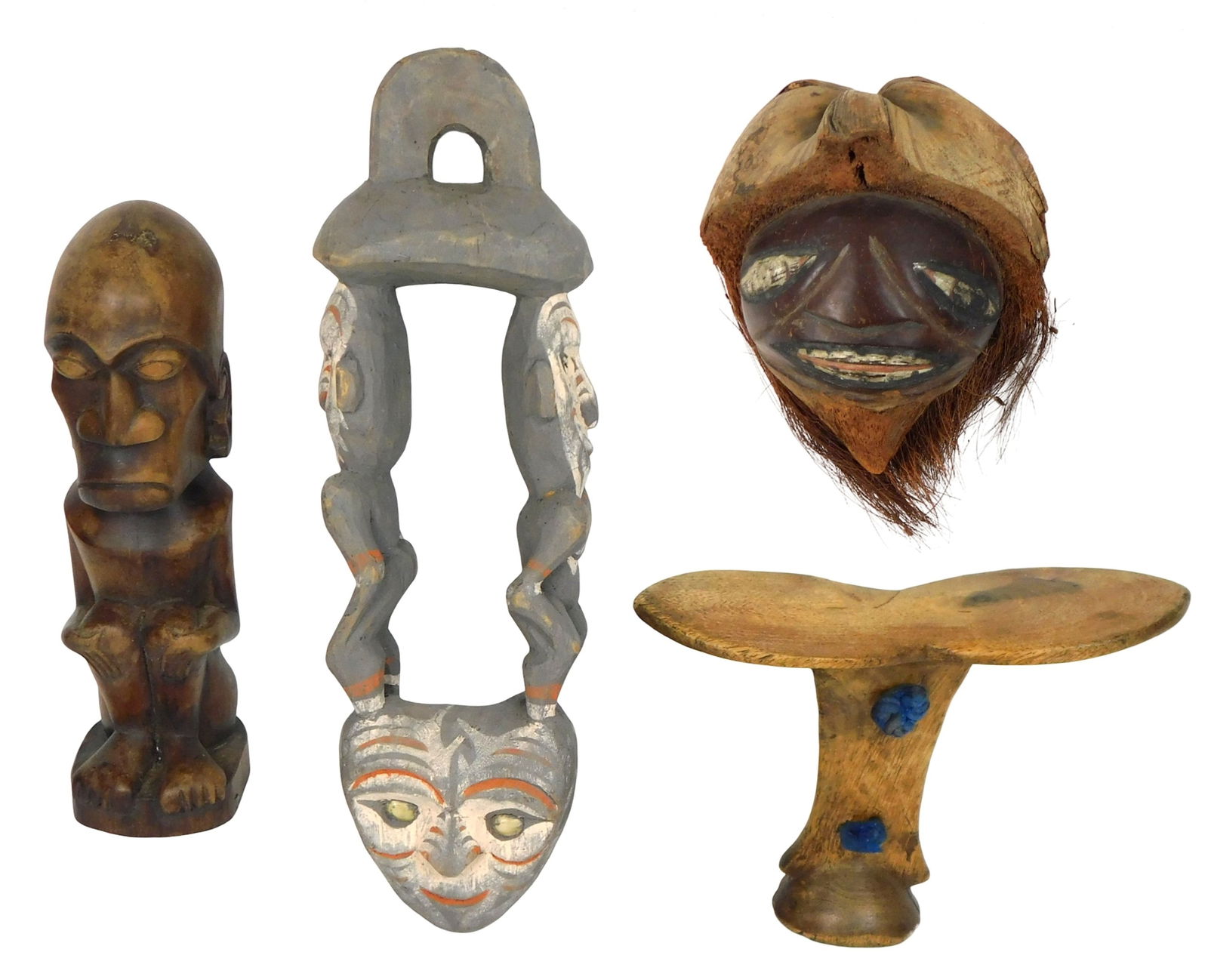 TRIBAL: Four West African carvings, 20th C., all carved wood, some with applied pigments, including: (1 of 3)