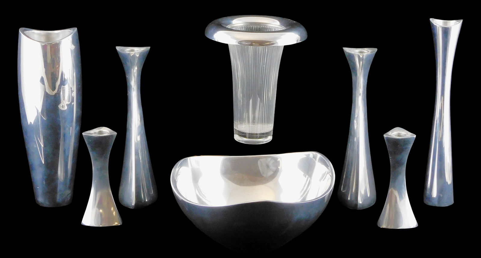 Nambe Studios metalware, American, c.1990’s-2010s, mid-century modern style, polished aluminum,: Nambe Studios metalware, American, c.1990’s-2010s, mid-century modern style, polished aluminum, all with maker’s mark, including: #527 bowl, 4” h. x 9 1/8” diam.; #6061 tall vase, scra