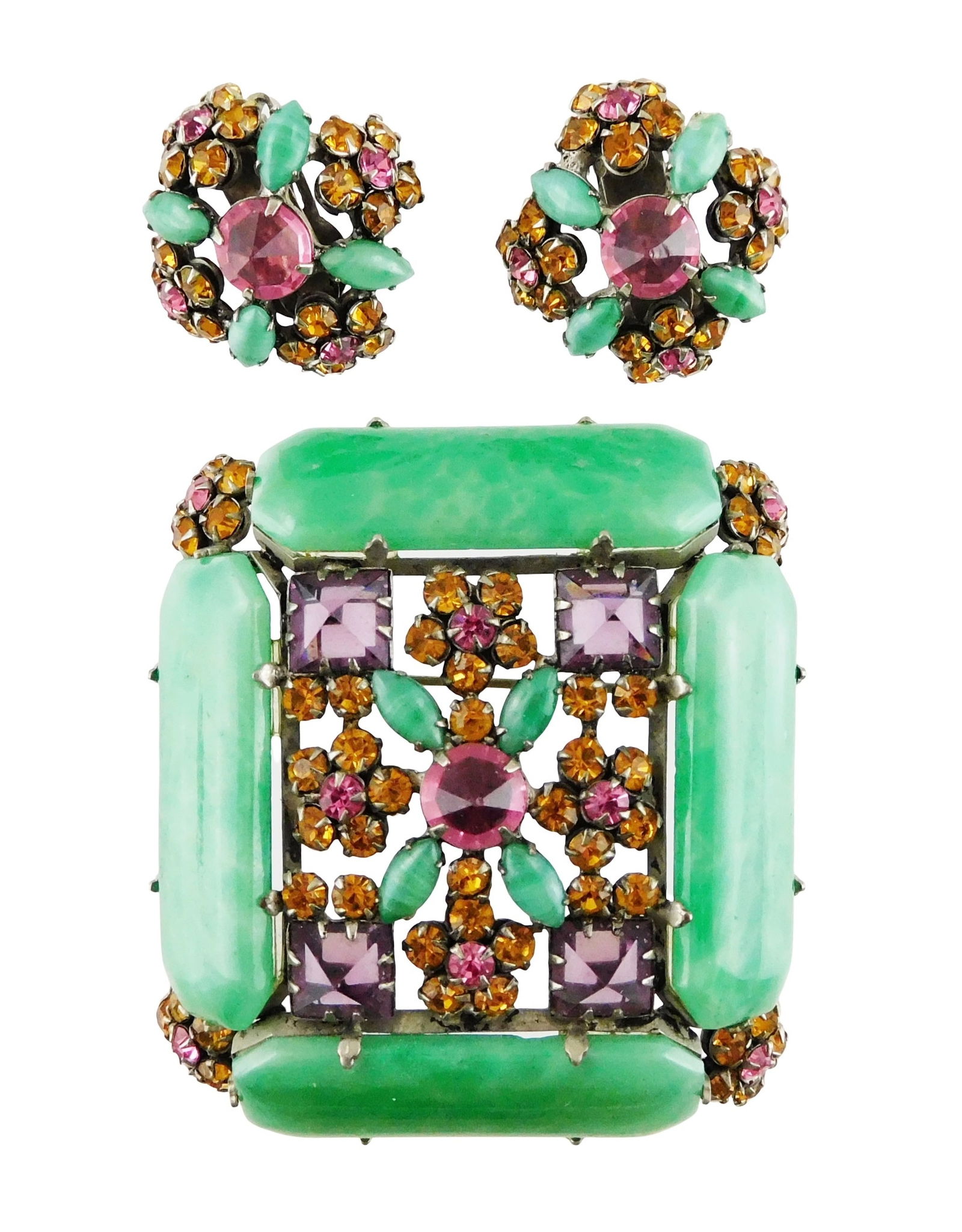 COSTUME JEWELRY: Rectangular brooch and earrings by Schreiner, New York, 20th C., signed, jade: COSTUME JEWELRY: Rectangular brooch and earrings by Schreiner, New York, 20th C., signed, jade colored oblong stones set at border interspersed with orange, pink and amethyst colored stones in a geome