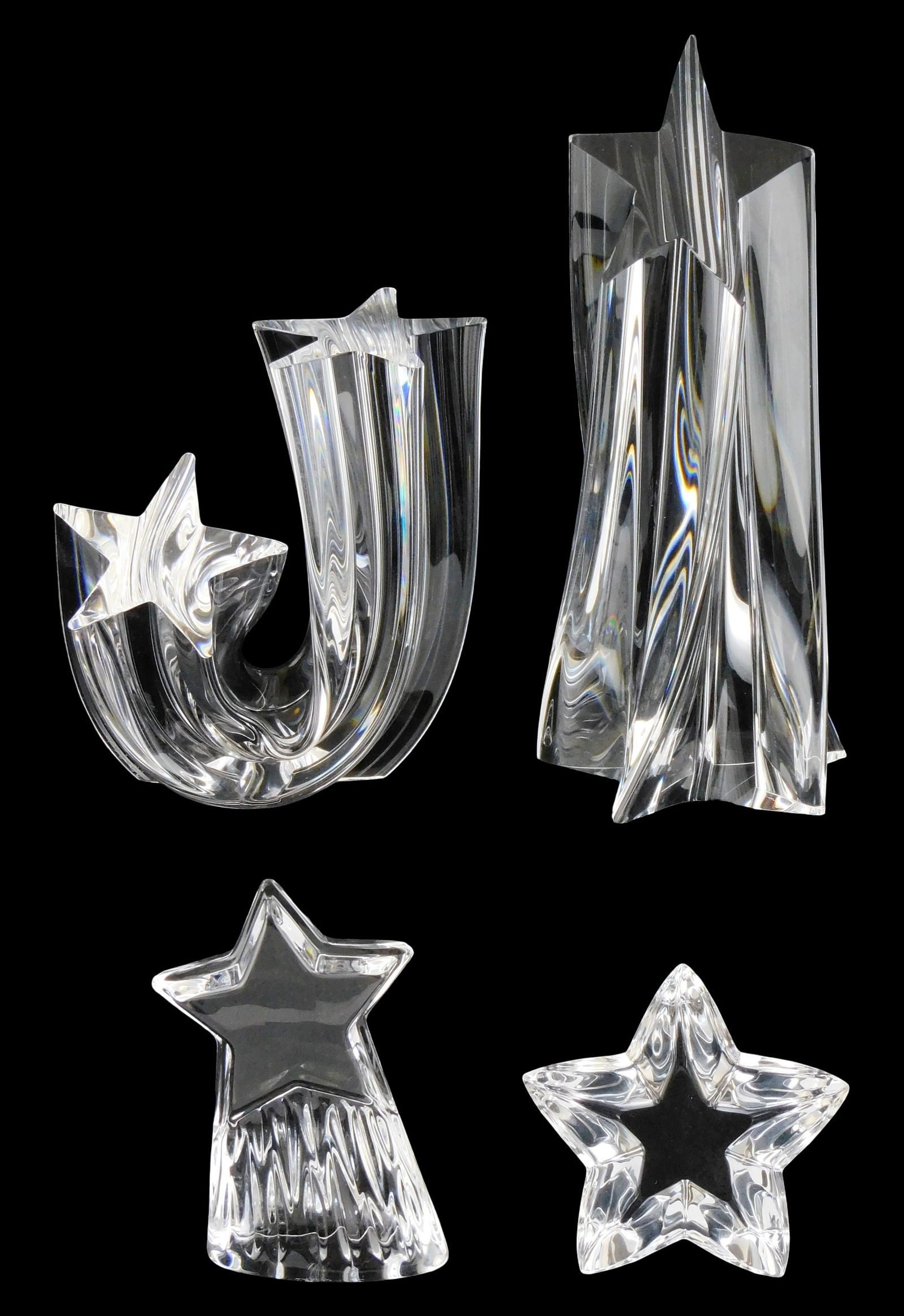 ART GLASS: Four Steuben crystal star themed paperweights, all signed, including: "Shining Star", (1 of 3)