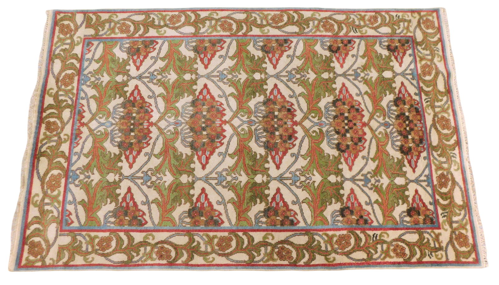 RUG: William Morris style, 5' 8" x 9', wool on cotton, stylized floral and foliate design on cream (1 of 4)