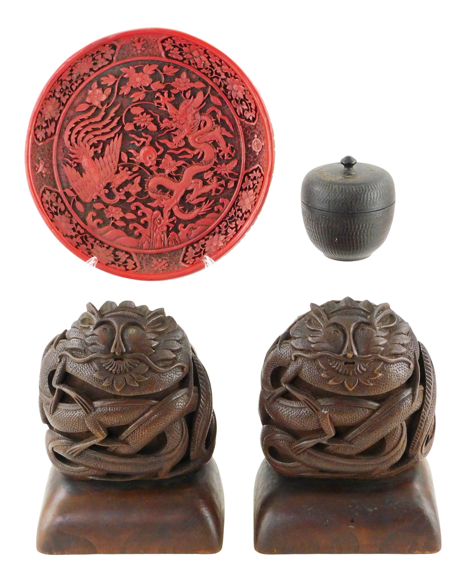 ASIAN: Carved wood Cinnabar plate, trinket box and bookends, including: Chinese dragon and phoenix: ASIAN: Carved wood Cinnabar plate, trinket box and bookends, including: Chinese dragon and phoenix Cinnabar plate, intricately decorated scene of two mythical creatures fighting, floral motif, 8" diam
