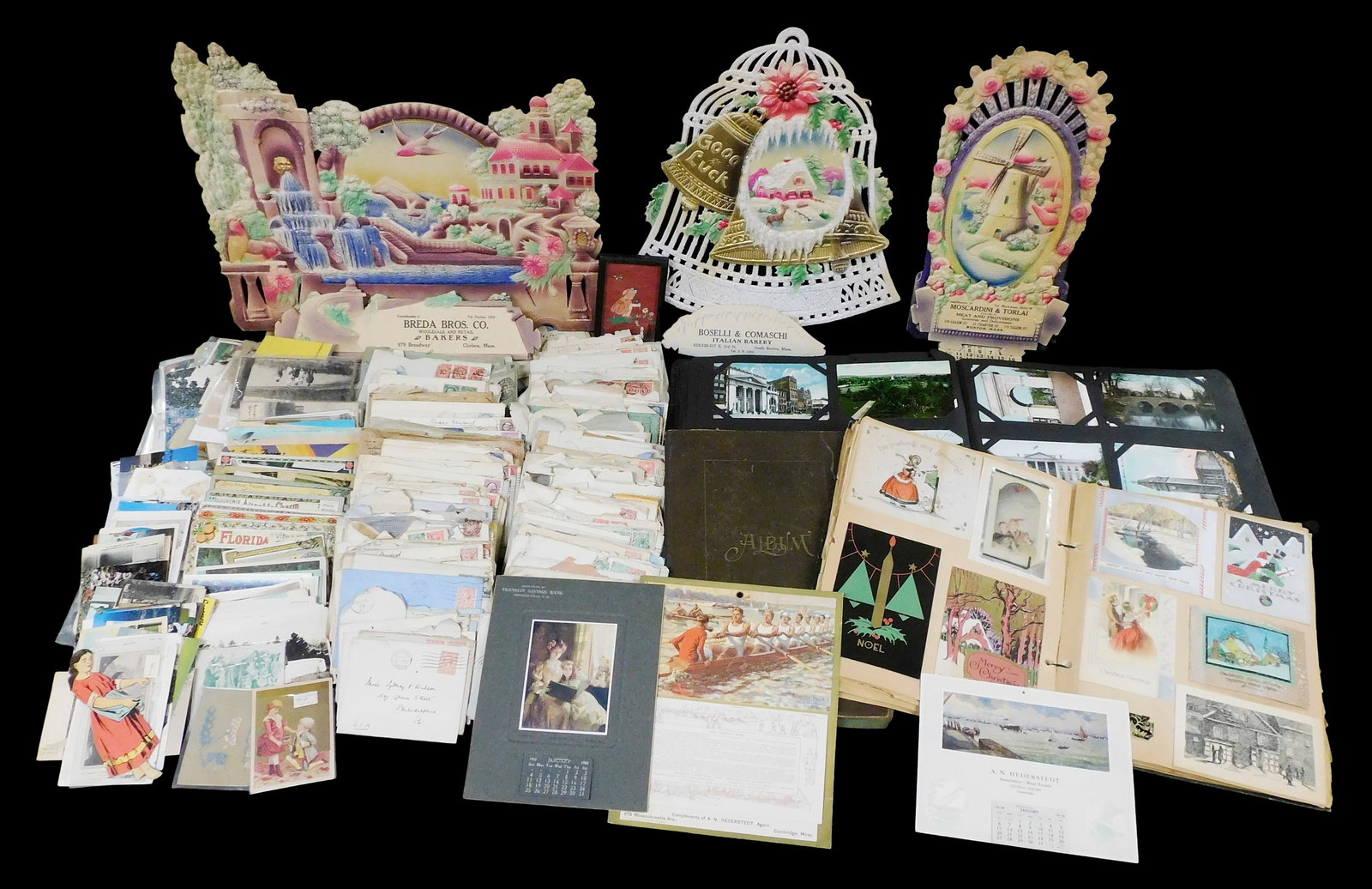 EPHEMERA: Large collection of postcards, trade cards, stamped envelopes, paper calendars, etc., (1 of 5)