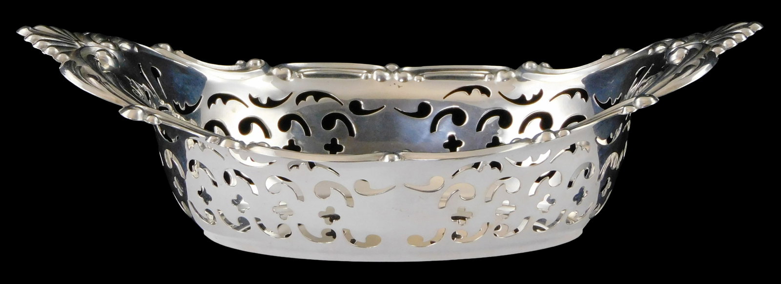 STERLING: Gorham "Cromwell" sterling silver candy dish, ornate repousse and pierced decoration,: STERLING: Gorham "Cromwell" sterling silver candy dish, ornate repousse and pierced decoration, maker's stamp on base, light wear consistent with age and use, 8 3/8" l. [Total Weight: 3.9 ozt. tw.]