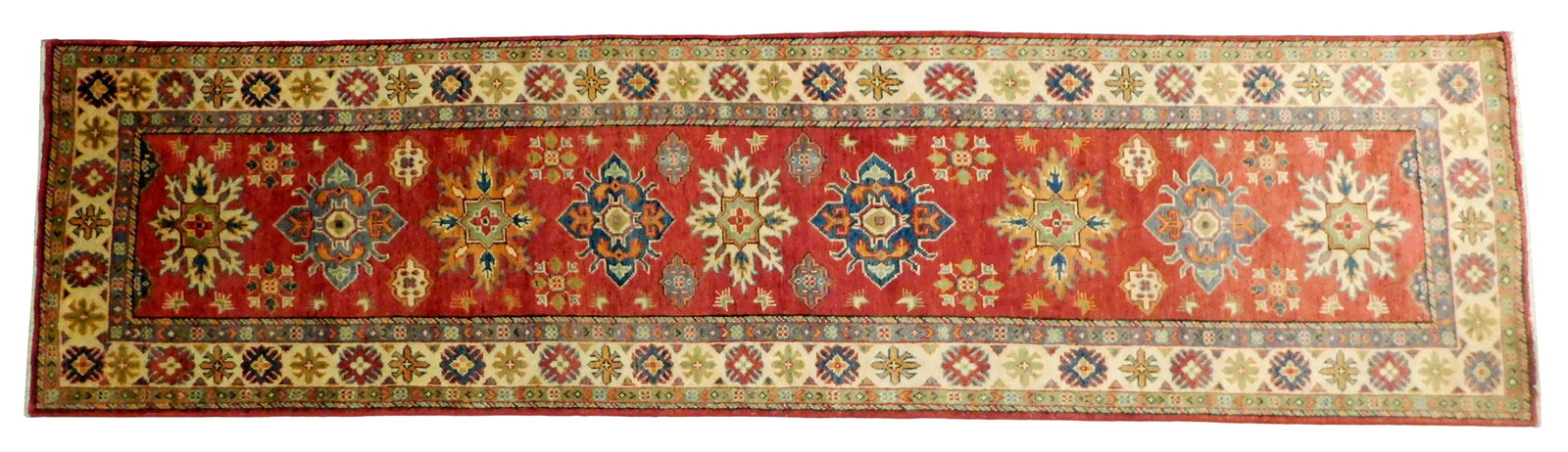 RUG: Uzbek Kazak runner, 2' 6" x 9' 9", classic geometric motifs, cream borders, red ground, wear (1 of 4)