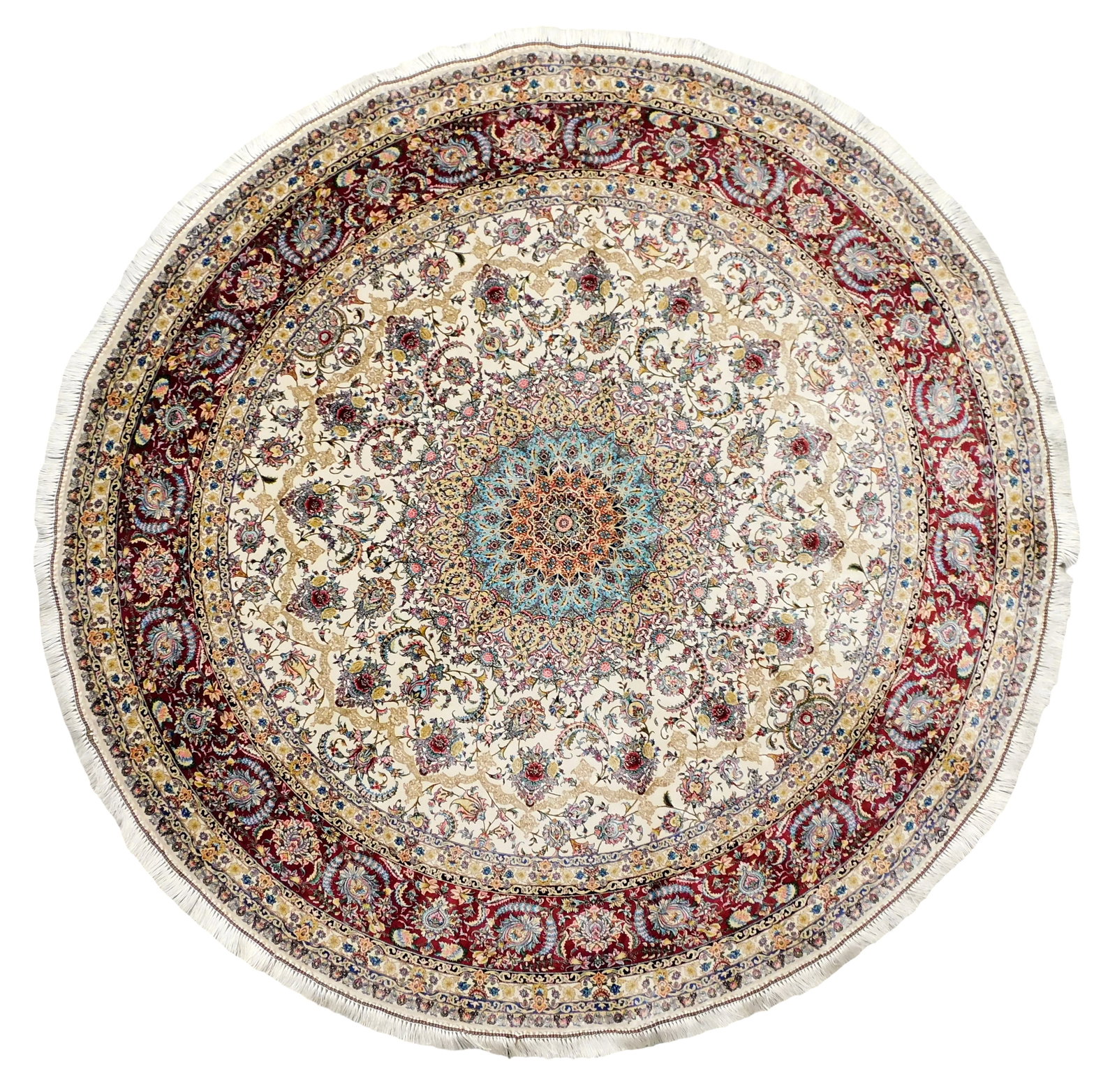 RUG: Persian silk Qum, 5' x 5' diam., silk on silk, bone ground, merlot primary border, central: RUG: Persian silk Qum, 5' x 5' diam., silk on silk, bone ground, merlot primary border, central medallion with floral and foliate motifs, wear consistent with age and use.