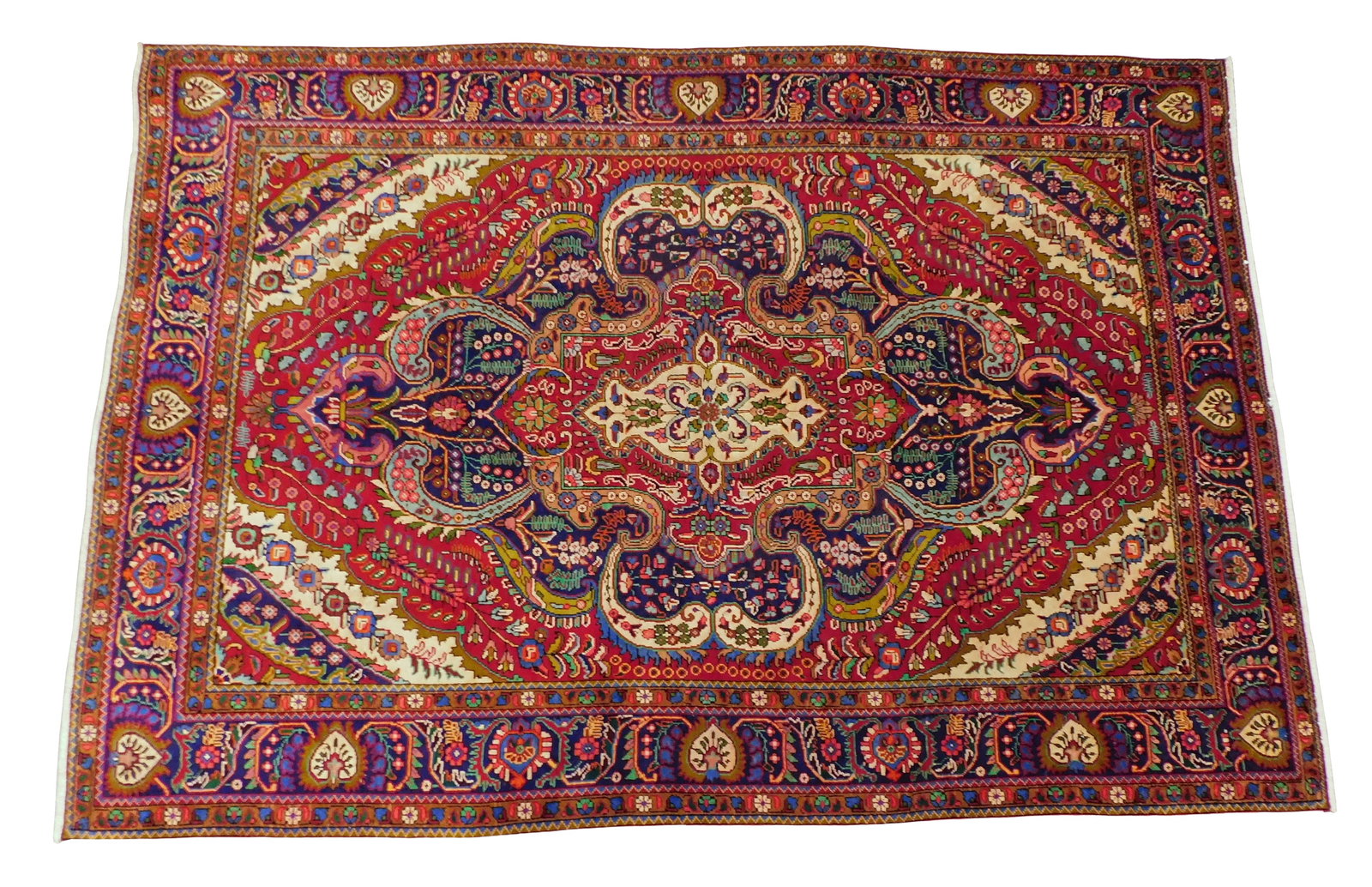 RUG: Persian Tabriz, 6' 6" x 9' 9", wool on cotton, cranberry ground, eggplant major border, central (1 of 5)