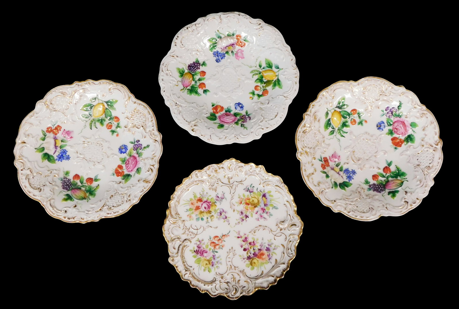 Four Meissen and KPM rococo porcelain plates, 19th-20th C., Germany, including: three Meissen (1 of 5)