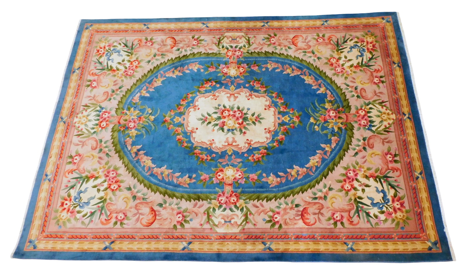 RUG: Chinese rug, 7' 11" x 11' 3", wool on cotton, cerulean ground, mauve major border, central: RUG: Chinese rug, 7' 11" x 11' 3", wool on cotton, cerulean ground, mauve major border, central medallion with floral and foliate motifs, rose, cream, gold, green and red accent colors, wear consisten