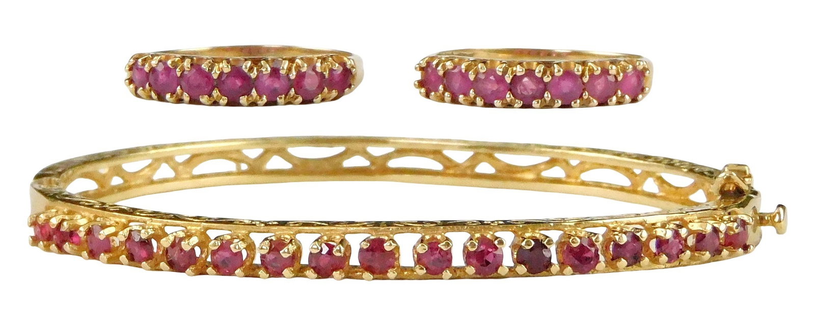 JEWELRY: 14K Ruby bangle bracelet and two 10K ruby bands, three pieces, details include: hinged (1 of 6)