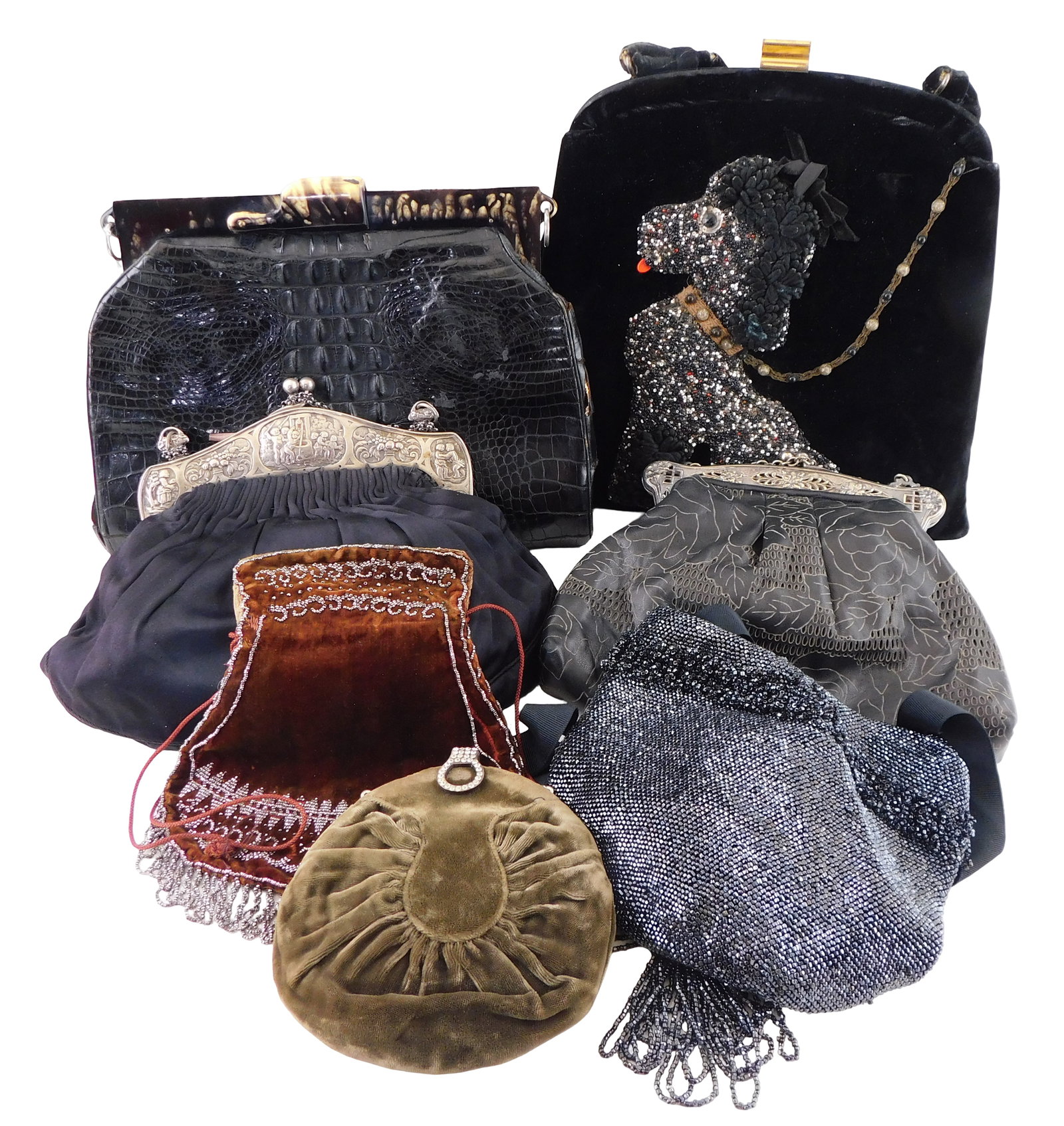 Seven vintage purses, early/mid 20th C., details include: laser-worked leather purse with marked (1 of 6)