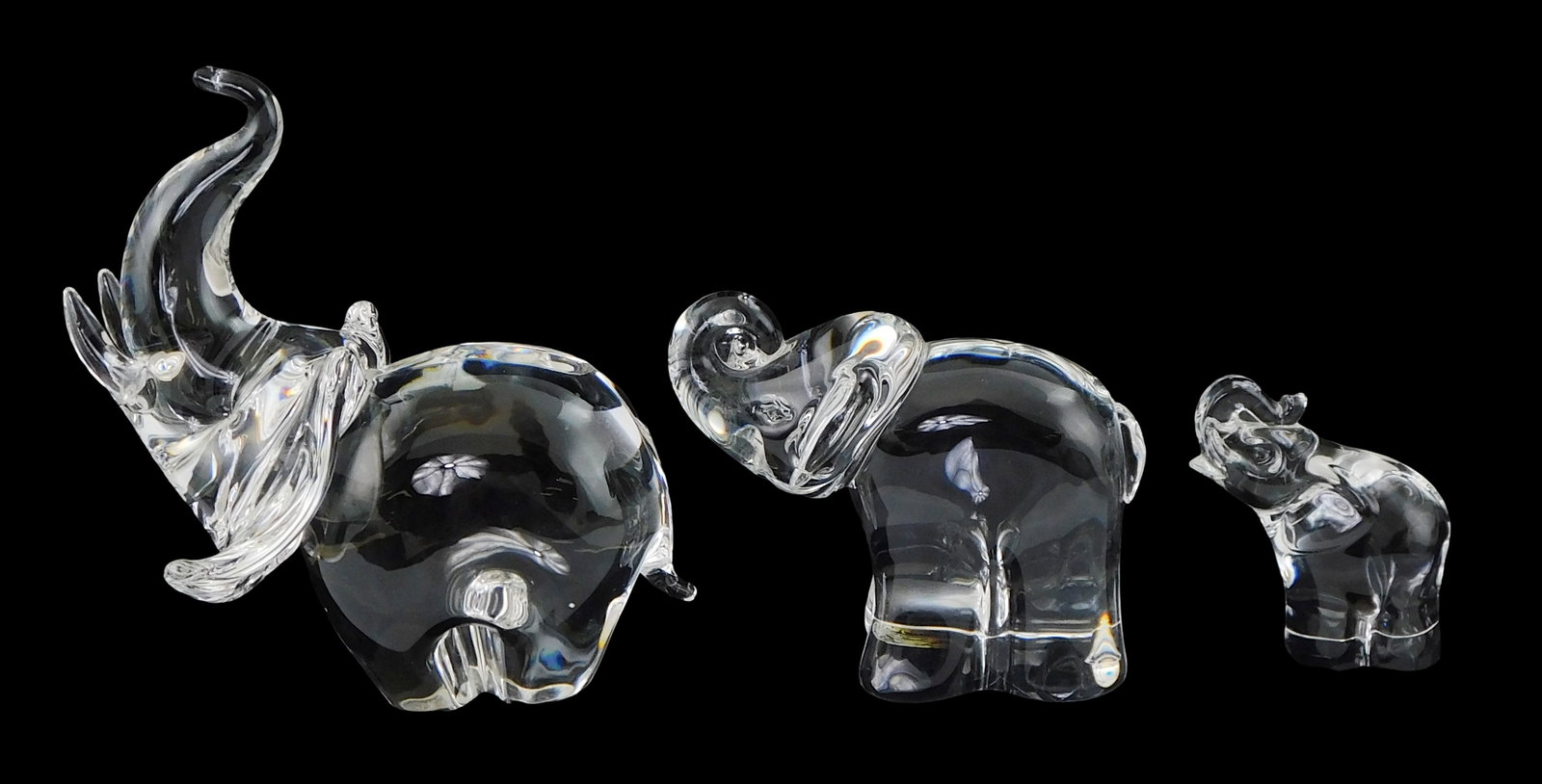 ART GLASS: Three Steuben elephant figures, all with signed base, including: large elephant, upturned (1 of 1)
