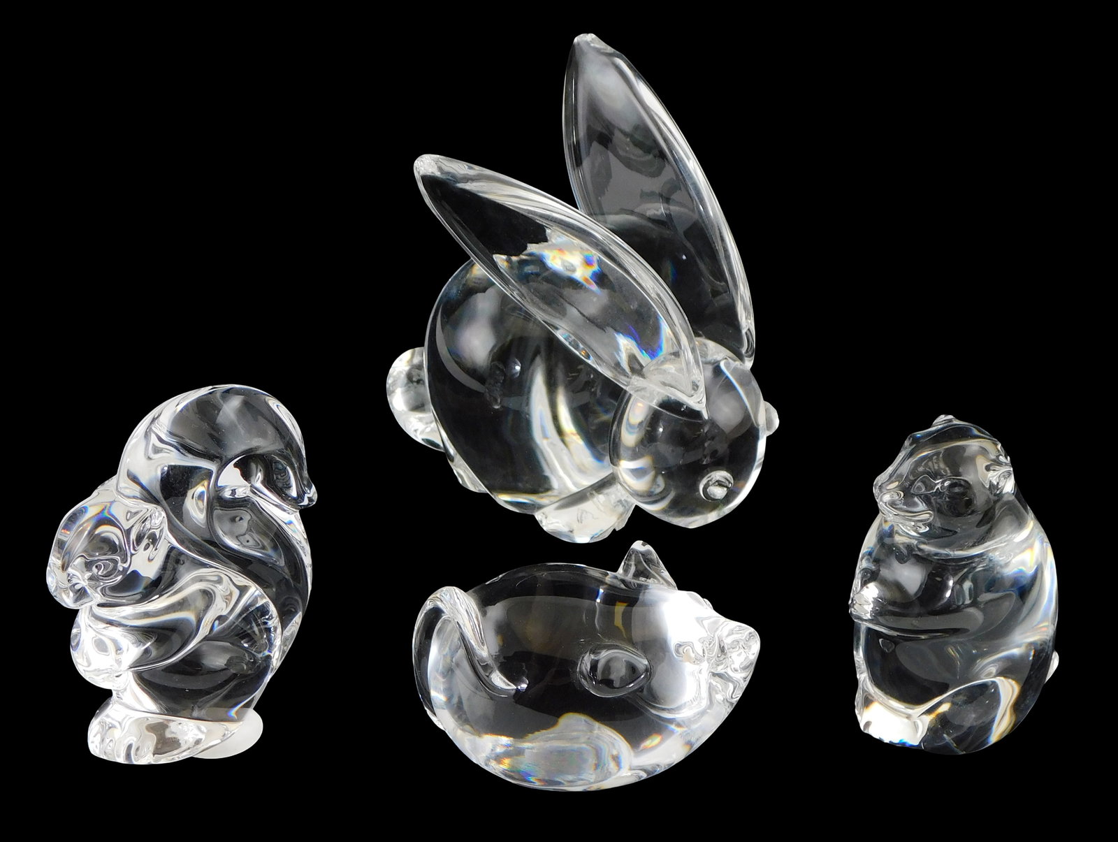 ART GLASS: Four Steuben crystal small mammal hand coolers, all with signed base, including: (1 of 2)