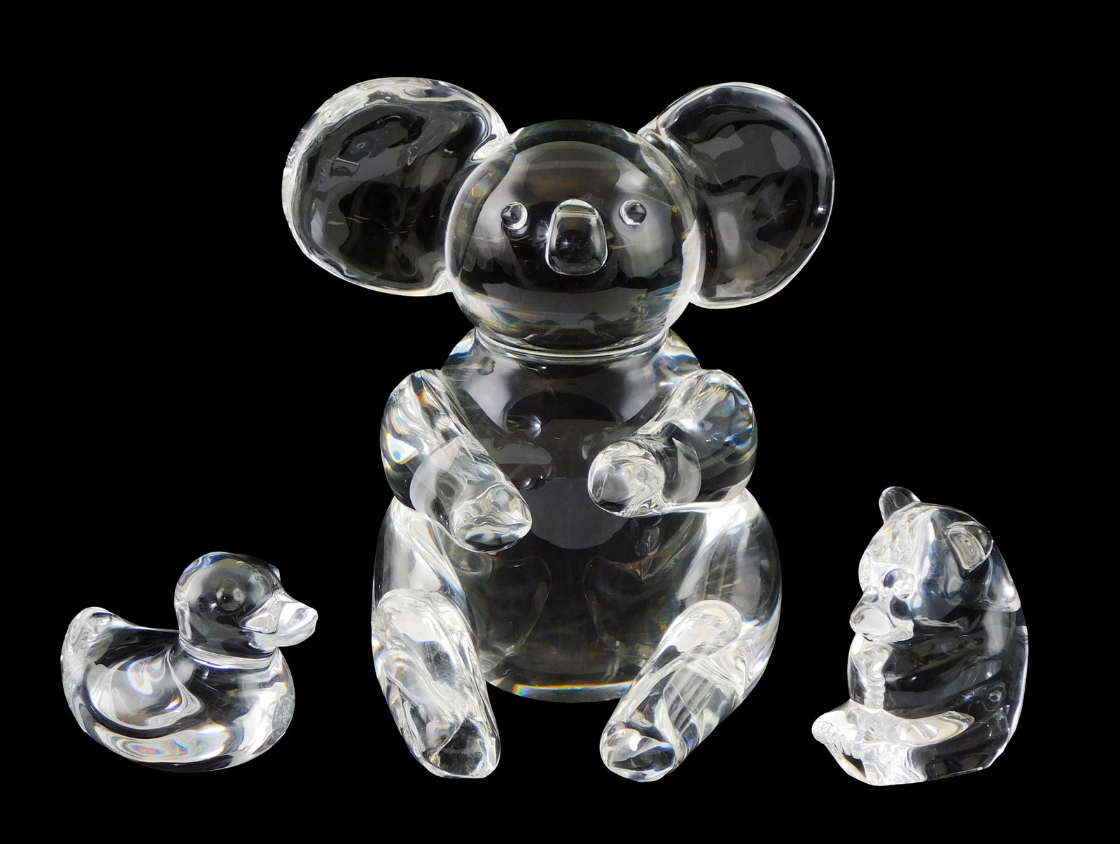 ART GLASS: Three Steuben crystal hand coolers and figure, all with signed base, including: panda (1 of 2)