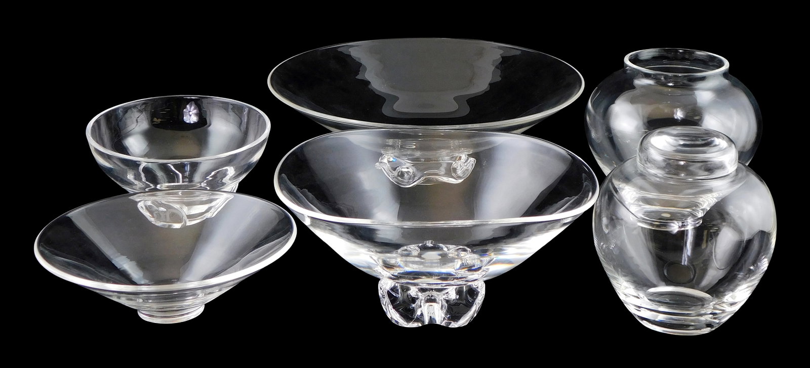 GLASS: Steuben servingware, six pieces: four bowls and two jars, including: “Trillium?? bowl;: GLASS: Steuben servingware, six pieces: four bowls and two jars, including: “Trillium” bowl; George Thompson bowl on ruffled foot; tri-footed bowl; simple bowl with no foot; ginger jar with li