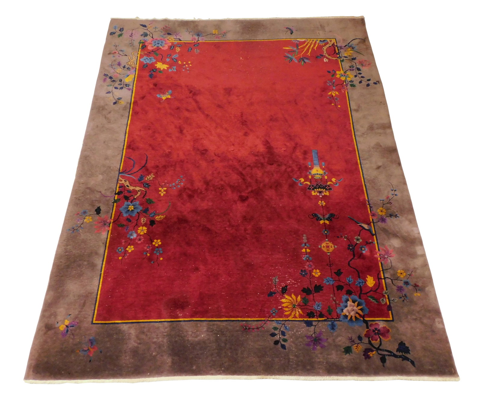 RUG: Semi-antique Chinese rug, 11' 6" x 8' 9", wool on cotton, maroon ground, grey major border,: RUG: Semi-antique Chinese rug, 11' 6" x 8' 9", wool on cotton, maroon ground, grey major border, navy-blue and gold minor borders, stylized birds, butterflies, and vessels, floral motifs, wear consist