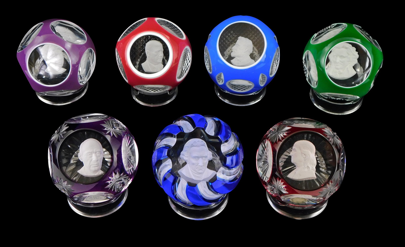 ART GLASS: Seven Baccarat crystal and sulphide famous Americans cameo paperweights, France, 20th C., (1 of 1)