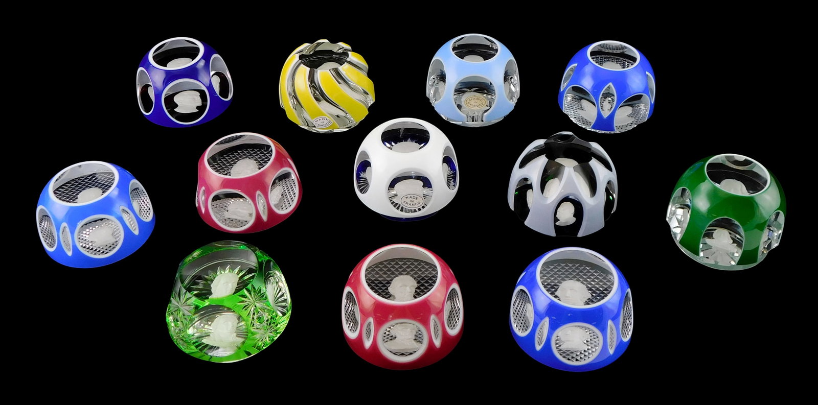 ART GLASS: Twelve Baccarat crystal and sulphide American president cameo paperweights, 20th C., (1 of 2)