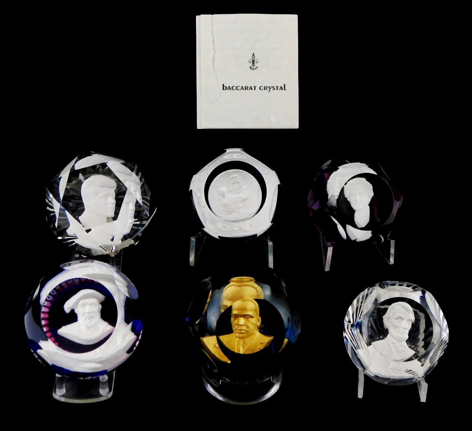 ART GLASS: Six crystal and sulphide cameo paperweights, Baccarat, Caithness and River Shore, 20th: ART GLASS: Six crystal and sulphide cameo paperweights, Baccarat, Caithness and River Shore, 20th C., including: River Shore Ltd. Norman Rockwell, 1979, clear orb on teal ground, five side facets and