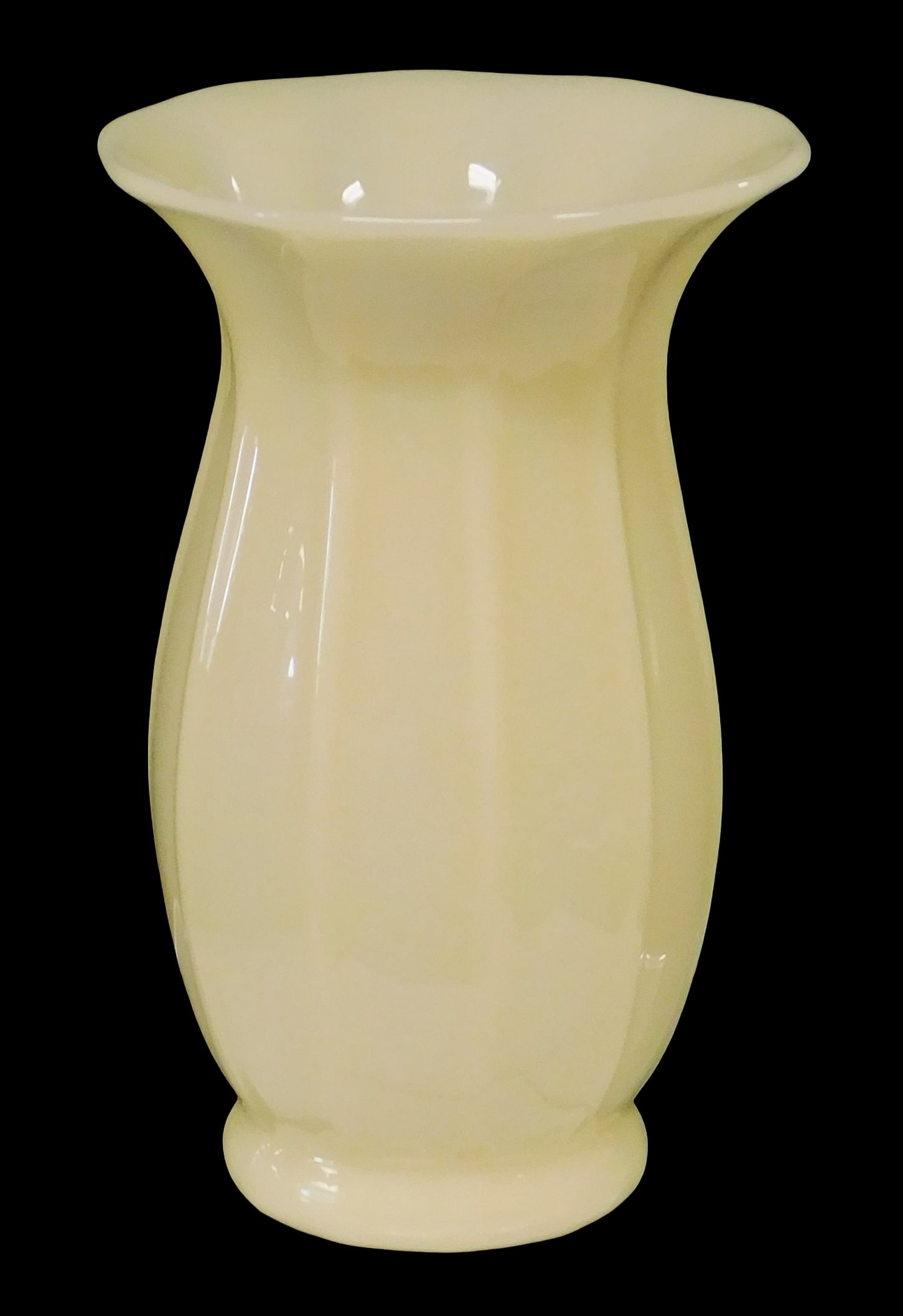ART GLASS: Steuben type vase, 20th C., pale yellow, baluster form with flared rim raised on small: ART GLASS: Steuben type vase, 20th C., pale yellow, baluster form with flared rim raised on small foot, unsigned, light wear consistent with age and decorative use, 6 5/8" h.