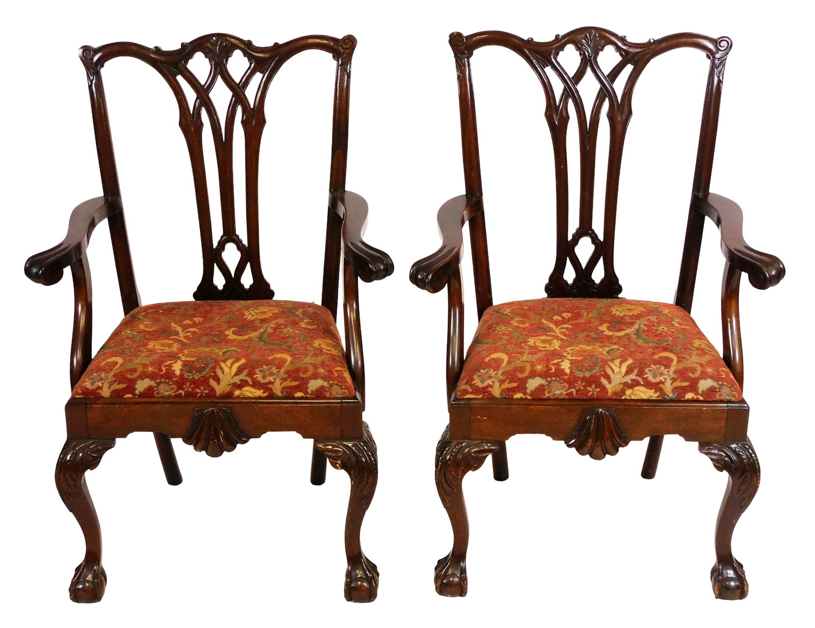 Pair of Chippendale style open armchairs, carved crest rail above interlaced pierced back splat,: Pair of Chippendale style open armchairs, carved crest rail above interlaced pierced back splat, shell carved skirt, scroll handles to arms, front cabriole legs ending on ball & claw feet, floral patt