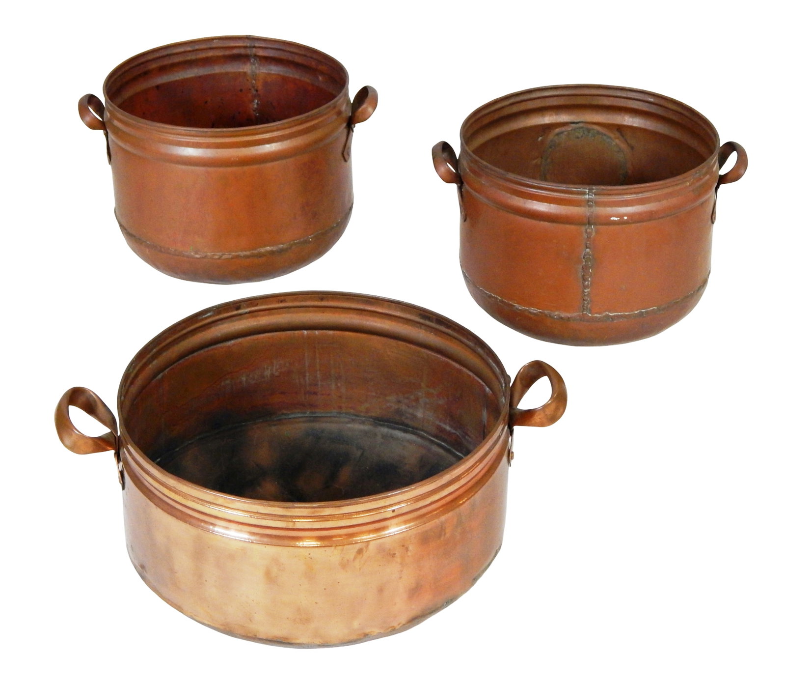 Three large rolled-edge copper basins, 20th C., cylindrical bodies with rolled ribs tapering to flat (1 of 3)