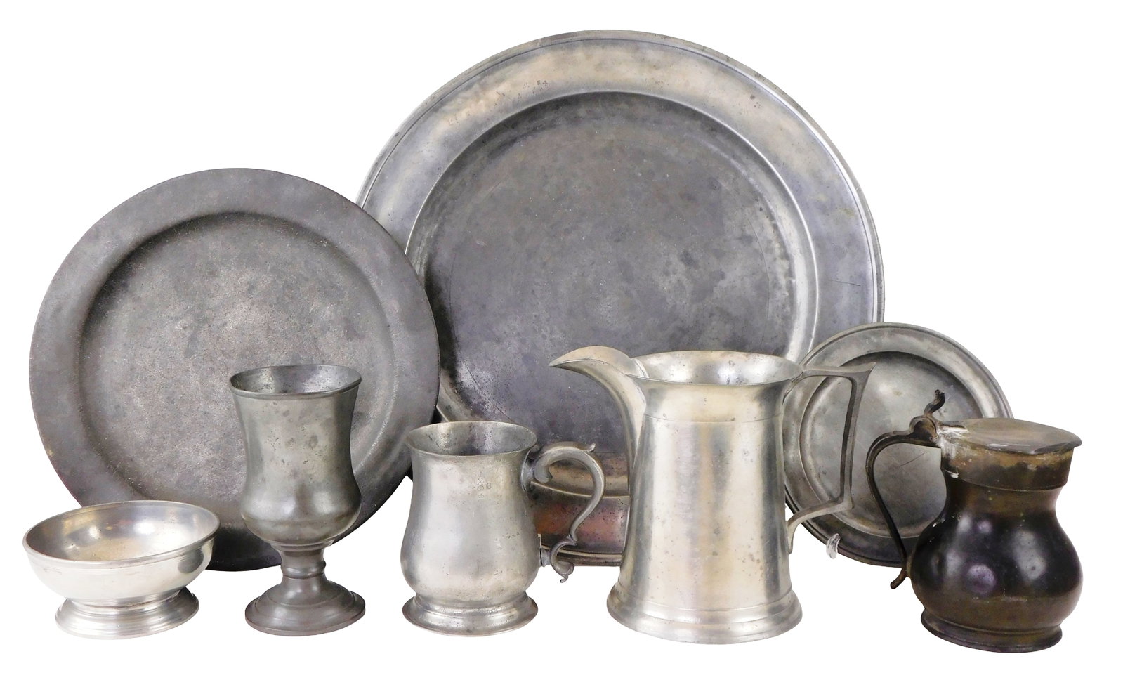 Late 18th- early 20th C. pewter dinnerware, eight pieces, including: charger; dinner plate or small (1 of 3)