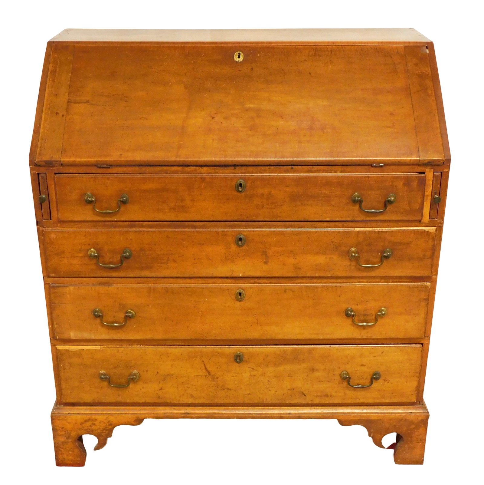 Slant lid desk, New England, c. 1790, maple, drop lid opening to seven drawers over seven: Slant lid desk, New England, c. 1790, maple, drop lid opening to seven drawers over seven pigeonholes over four long drawers on four straight bracket feet, damages to lid and two drawer lips, old refi