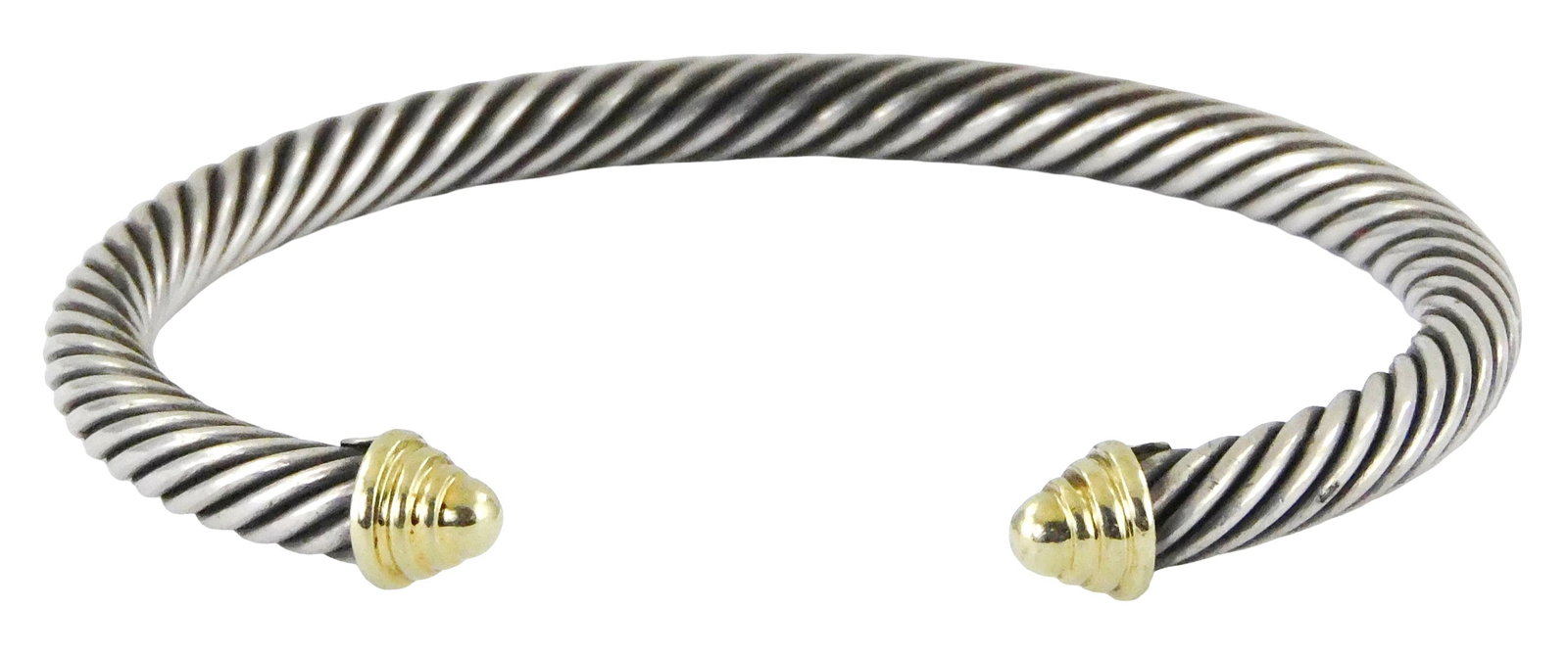JEWELRY: David Yurman 14K and sterling cable cuff bracelet, 5mm cable width, silver twisted cable: JEWELRY: David Yurman 14K and sterling cable cuff bracelet, 5mm cable width, silver twisted cable band capped with 14K yellow gold finials, stamped hallmarks below finial to the interior "D.Y. 925 585