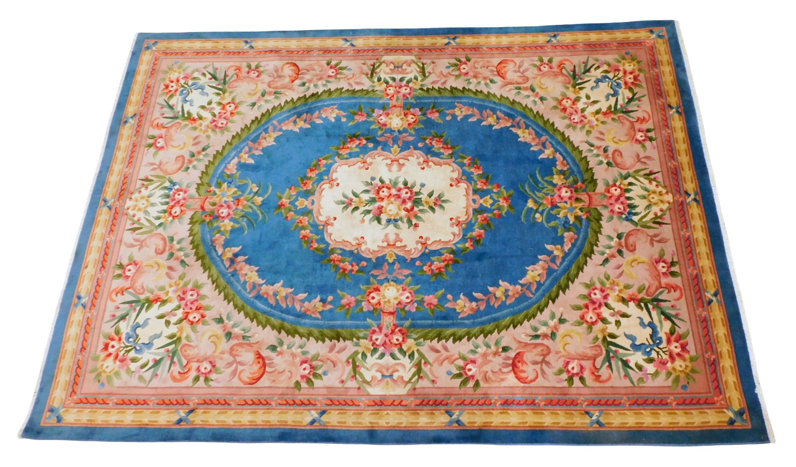 RUG: Chinese rug, 7' 11" x 11' 3", wool on cotton, cerulean ground, mauve major border, central: RUG: Chinese rug, 7' 11" x 11' 3", wool on cotton, cerulean ground, mauve major border, central medallion with floral and foliate motifs, rose, cream, gold, green and red accent colors, wear consisten