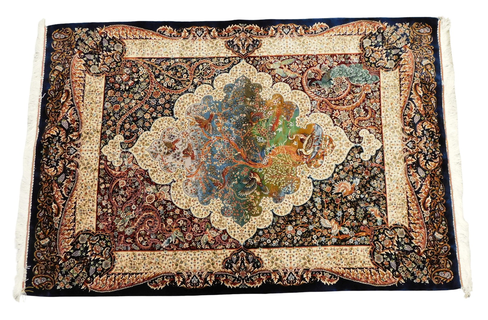 RUG: Silk Qum rug, 3' x 5', silk on silk, foliate and bird motif, central medallion with a light: RUG: Silk Qum rug, 3' x 5', silk on silk, foliate and bird motif, central medallion with a light blue to green ombre design, navy and crimson ground, bone border with accents of teal, gold, mustard an