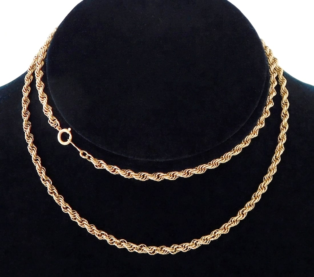 JEWELRY: 14K Yellow gold spiral chain necklace, stamped "FN 14K" on link and "14K" on clasp, 24" l.: JEWELRY: 14K Yellow gold spiral chain necklace, stamped "FN 14K" on link and "14K" on clasp, 24" l. [Total Weight: 13.0 grams]