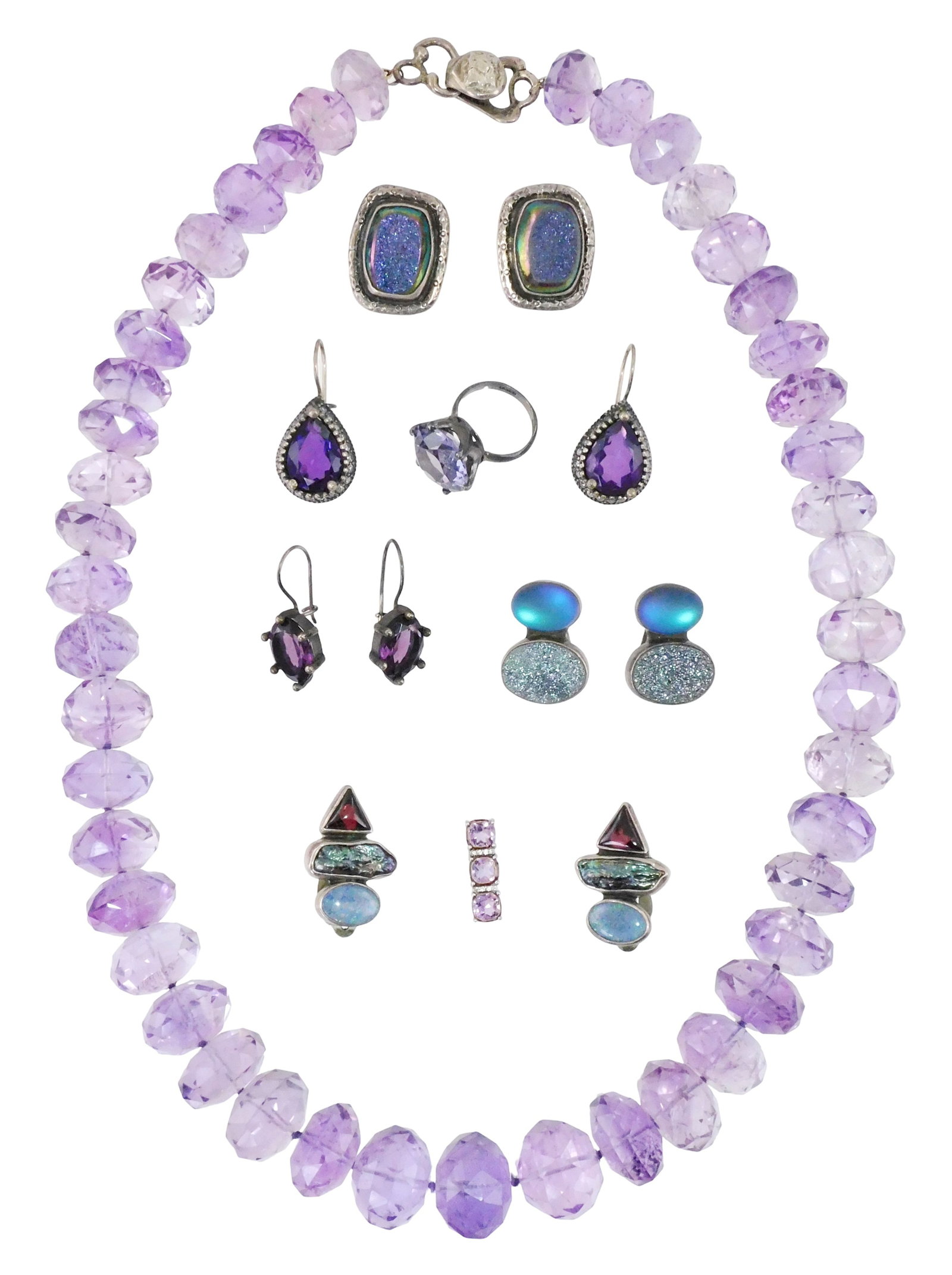 JEWELRY: Amy Kahn Russell, Taxco, etc., thirteen silver jewelry pieces, many with amethyst and geode: JEWELRY: Amy Kahn Russell, Taxco, etc., thirteen silver jewelry pieces, many with amethyst and geode type stones, many signed, all pieces stamped sterling or tested silver, details include: three pair
