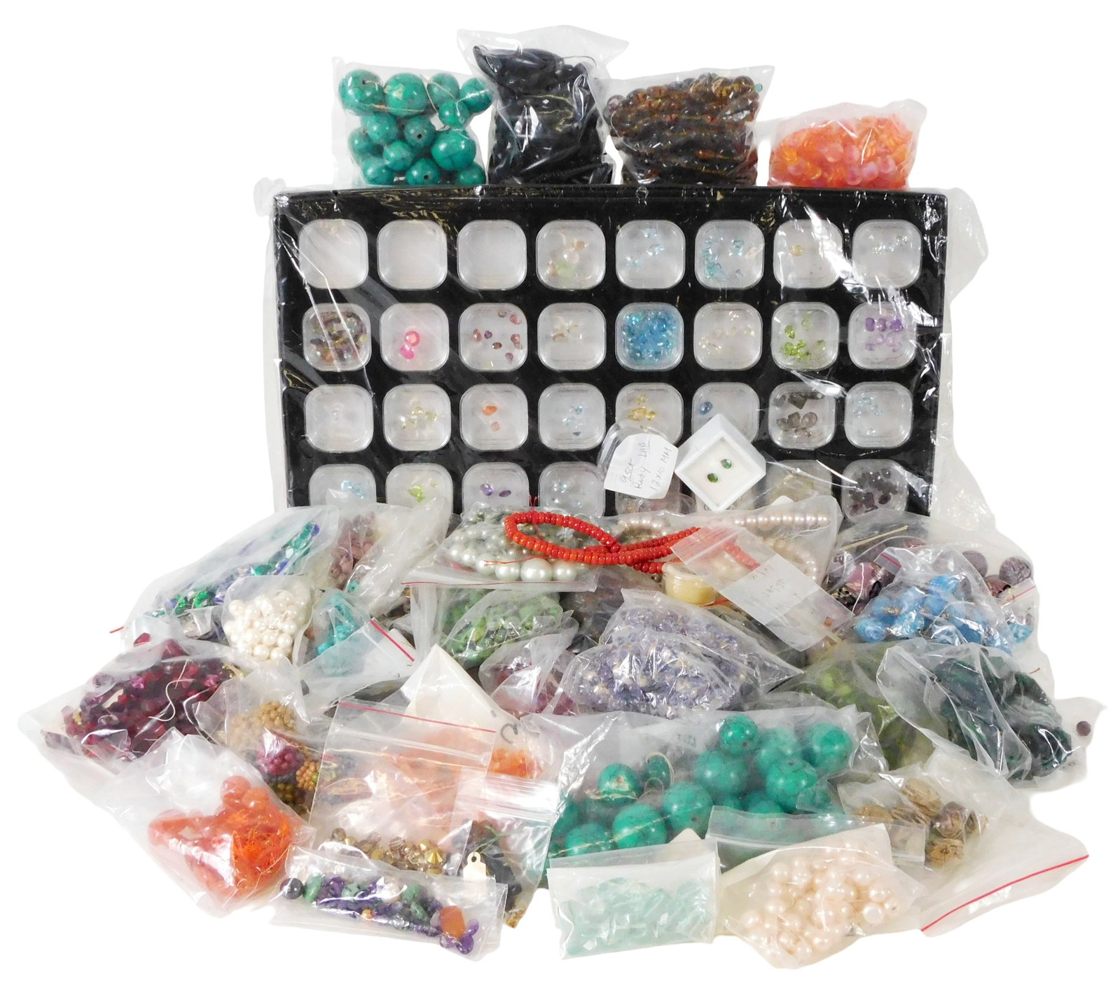 COSTUME JEWELRY: Loose materials and cut stones for jewelry-making, many appear to be (1 of 4)