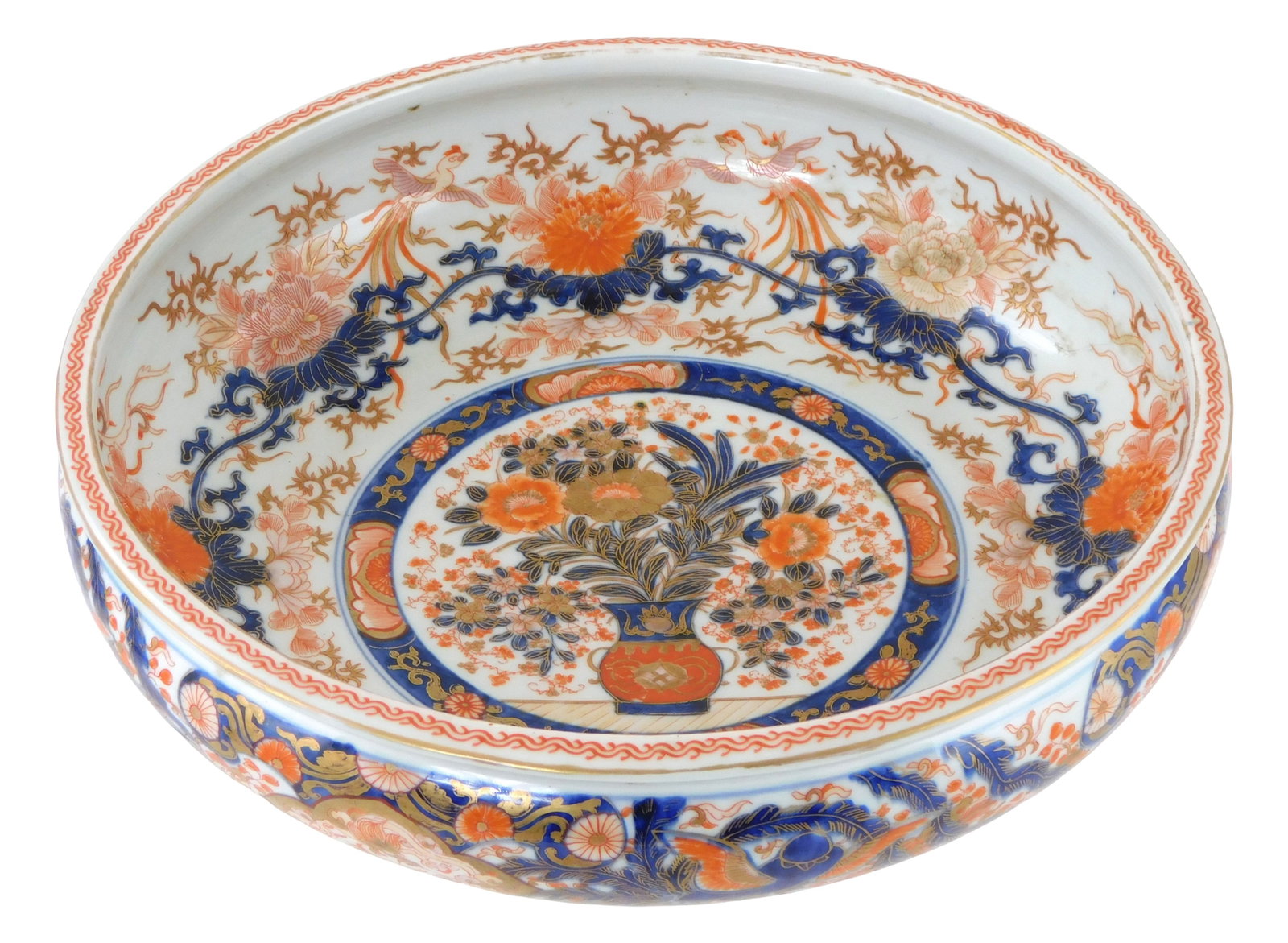 ASIAN: Japanese Imari shallow bowl, 19th/ 20th C., decorated with floral and foliate decoration in: ASIAN: Japanese Imari shallow bowl, 19th/ 20th C., decorated with floral and foliate decoration in iron red and gold over blue underglaze, signed on base "Yukitake Sei", wear consistent with age and u