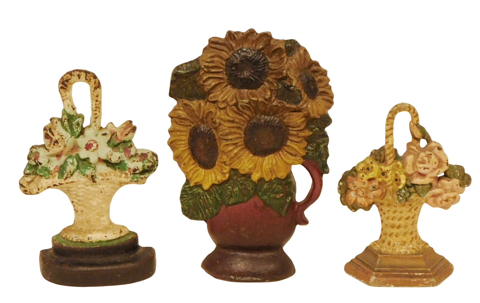 Hubley, etc., three cast iron doorstops, including: Hubley basket of flowers, stamped "43" verso, 6 (1 of 2)