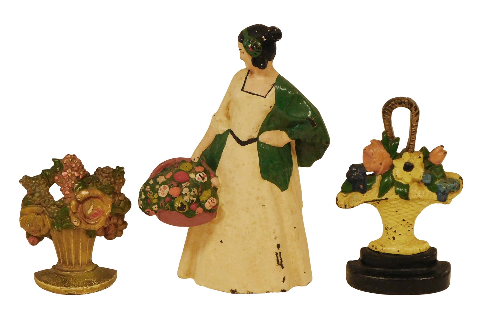 Hubley, etc., three cast iron doorstops, including: Hubley "Mixed Flower Basket", stamped "479" (1 of 2)
