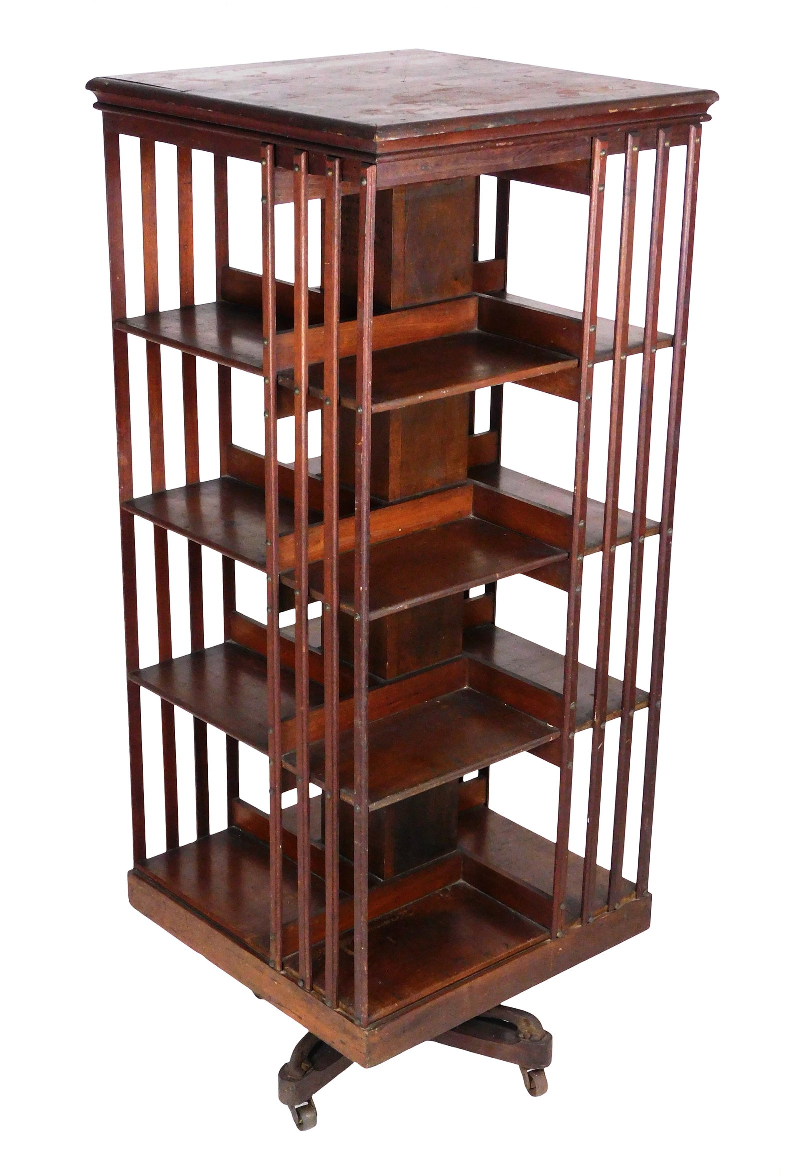 Revolving bookcase, John Danner Manufacturing Company, Ohio, late 19th C., walnut on raised casters, (1 of 5)