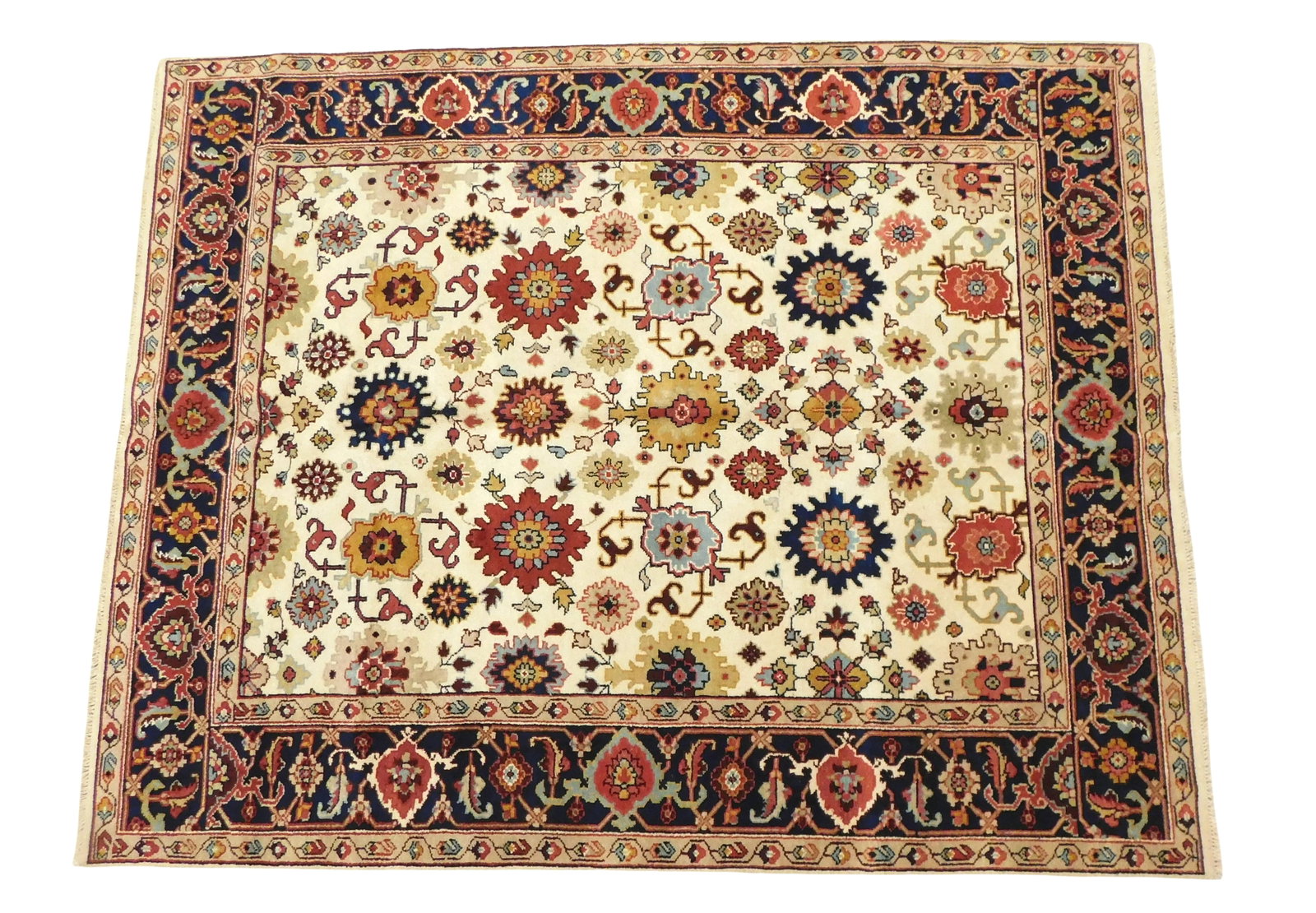 RUG: Agra Mahal carpet, 8' 1" x 10', wool on cotton, flowering vine motif, navy border, cream: RUG: Agra Mahal carpet, 8' 1" x 10', wool on cotton, flowering vine motif, navy border, cream ground, wear consistent with age and use, made in the last ten years.
