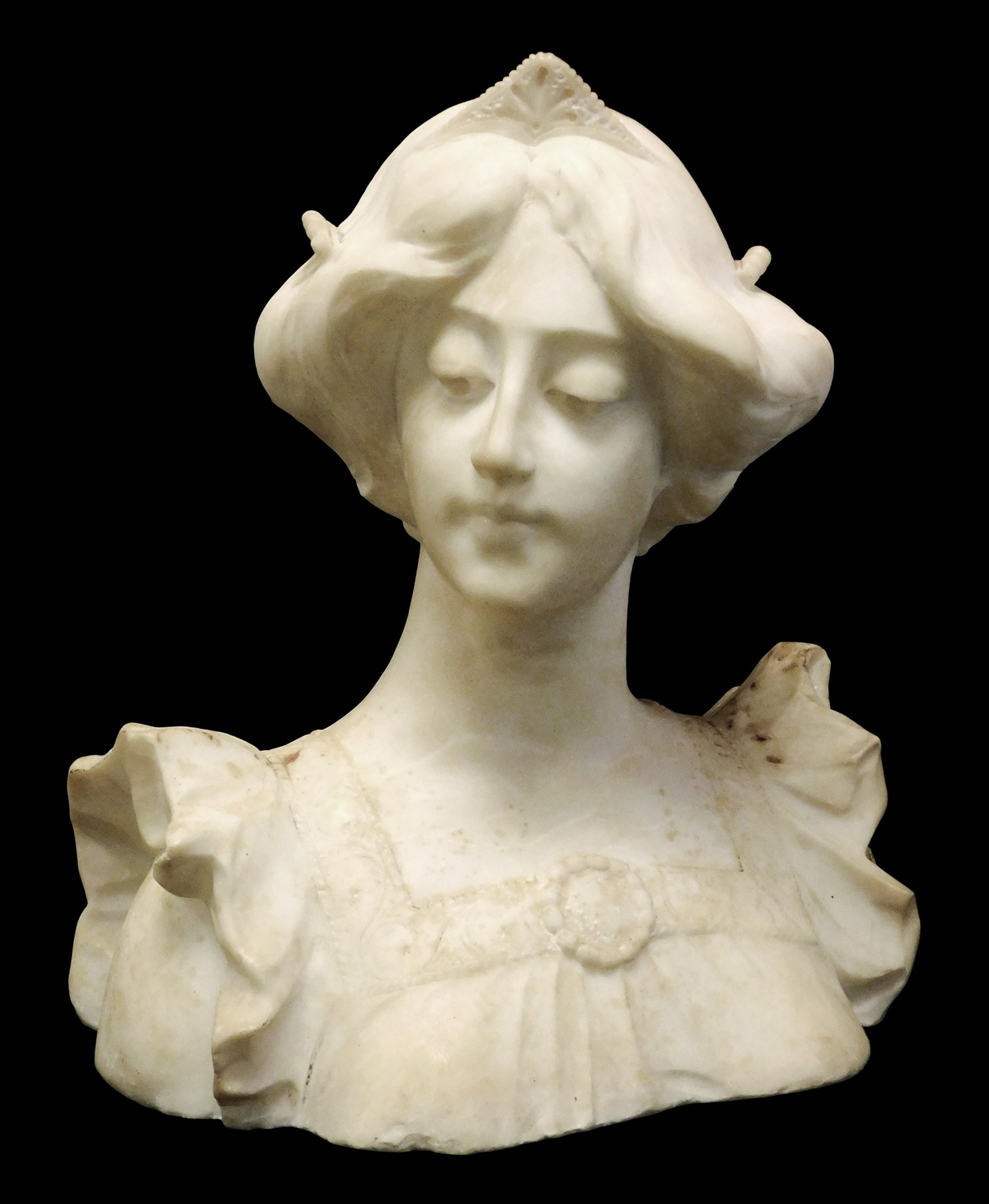 Adolfo Cipriani (Italian, 1857-1941), alabaster bust of woman, late 19th-early 20th C., depiction of: Adolfo Cipriani (Italian, 1857-1941), alabaster bust of woman, late 19th-early 20th C., depiction of young lady with crown on head, hair pulled back, ruffled sleeve dress with patterned border, broach