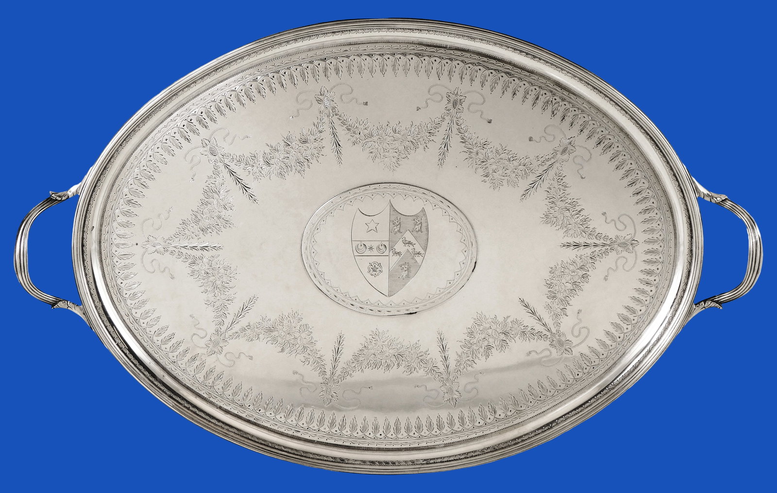 STERLING: George III sterling silver bright cut oval tray, London, 1802, "WB" maker's marks: STERLING: George III sterling silver bright cut oval tray, London, 1802, "WB" maker's marks resembling that of William Bateman (reg. 1815), engraved with heraldic shield, flower and ribbon decorated s