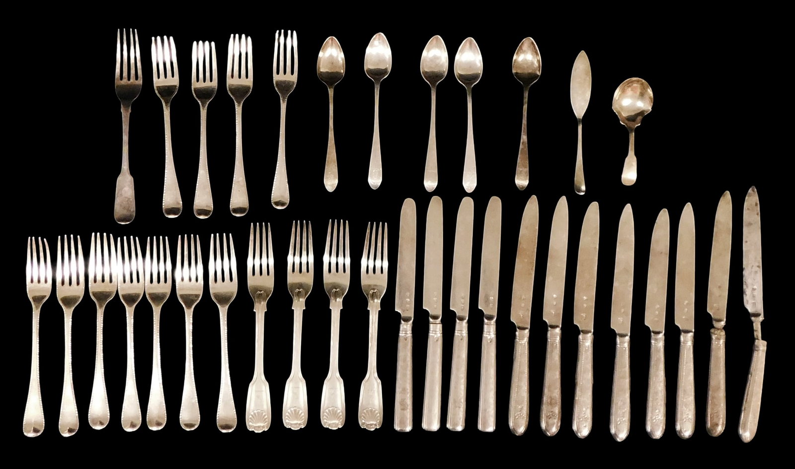 STERLING: Early British sterling silver flatware, thirty-one pieces, many with Georgian duty mark (1 of 4)