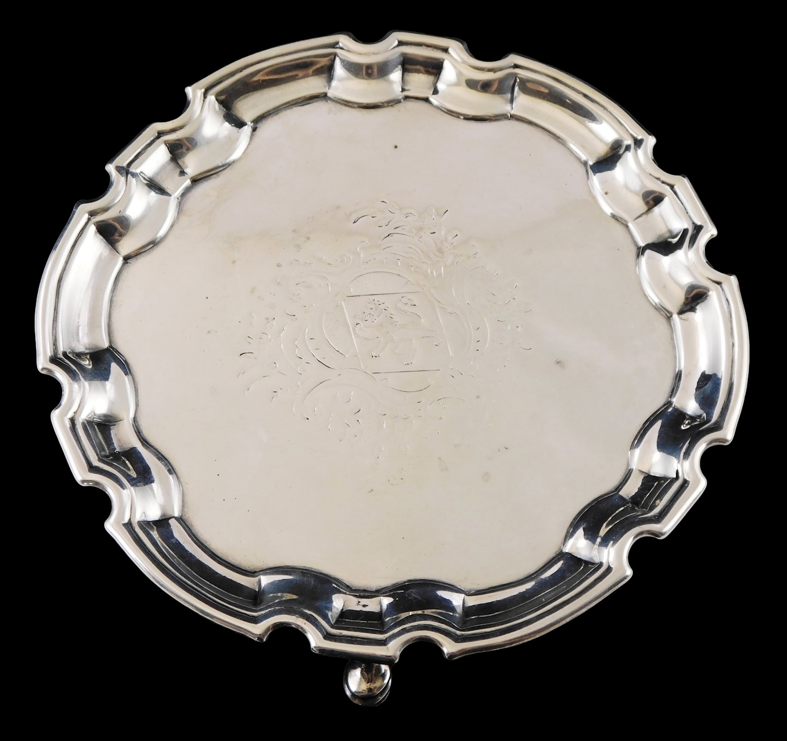 STERLING: Georgian salver by John Tuite (London, reg. 1723) dated 1731, engraved crest at center of: STERLING: Georgian salver by John Tuite (London, reg. 1723) dated 1731, engraved crest at center of rampant lion, crenellated and stepped rim, hallmarked on reverse with maker's mark, city mark for Lo