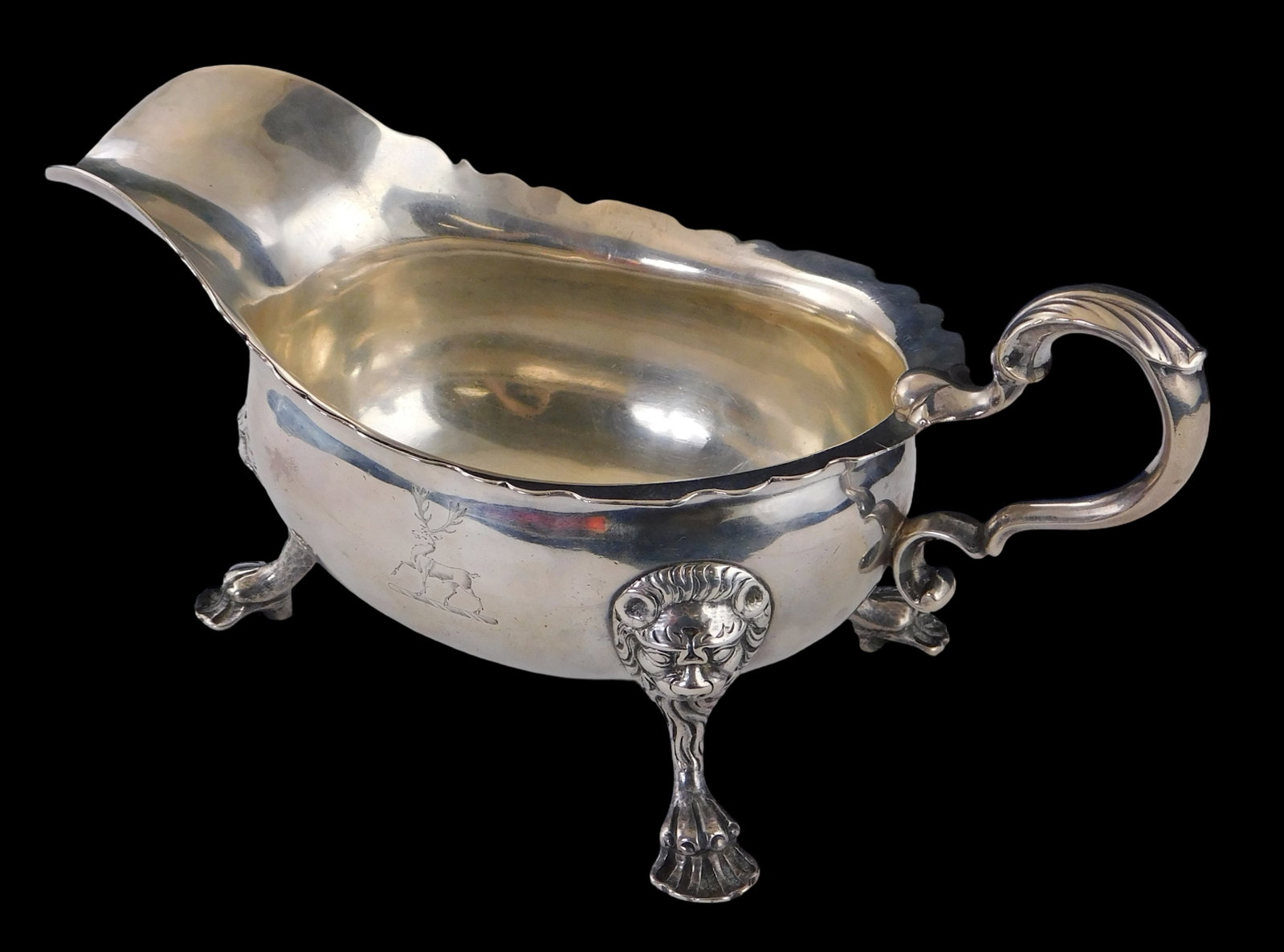 STERLING: Silver sauce boat, lion mask-capped paw feet, engraved crest of stag to side, three worn (1 of 6)