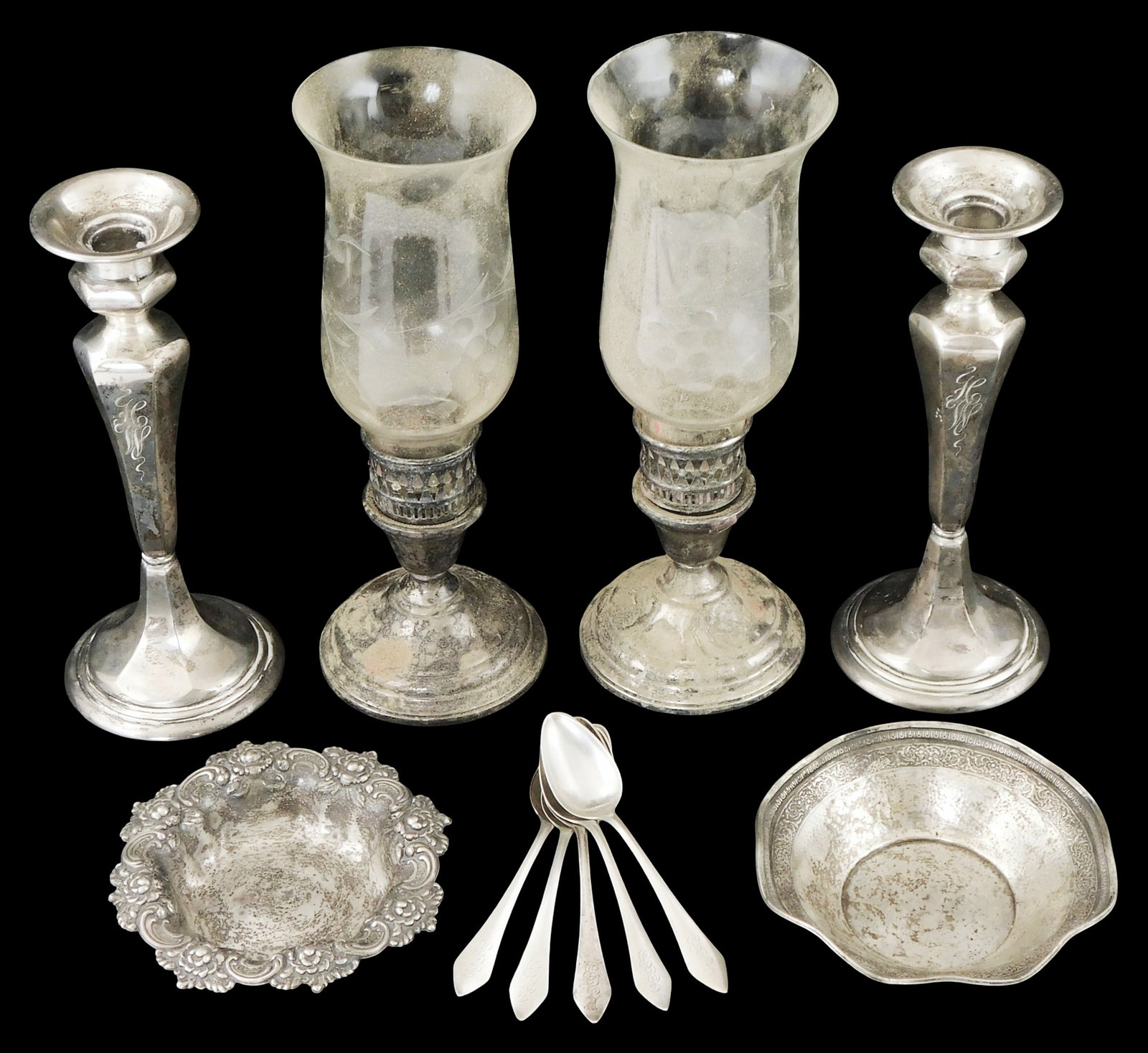 STERLING: Sterling silver dishes, spoons, and weighted candle sticks, eleven pieces, 19th-early 20th: STERLING: Sterling silver dishes, spoons, and weighted candle sticks, eleven pieces, 19th-early 20th C., all with maker's marks and stamped "Sterling", details include: Webster Co. small shallow bowl,
