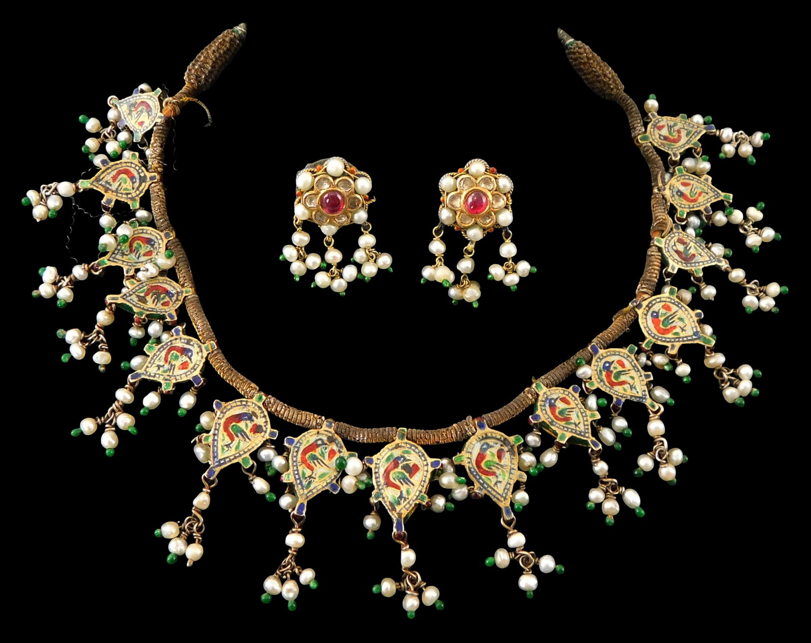 JEWELRY: Gold Plated Gemstone and Enameled Indian Necklace with Earrings: Cord necklace wrapped in: JEWELRY: Gold Plated Gemstone and Enameled Indian Necklace with Earrings: Cord necklace wrapped in wire with 15 pear shaped drops, tested 22K yellow gold top settings and 18k yellow gold backs, Length