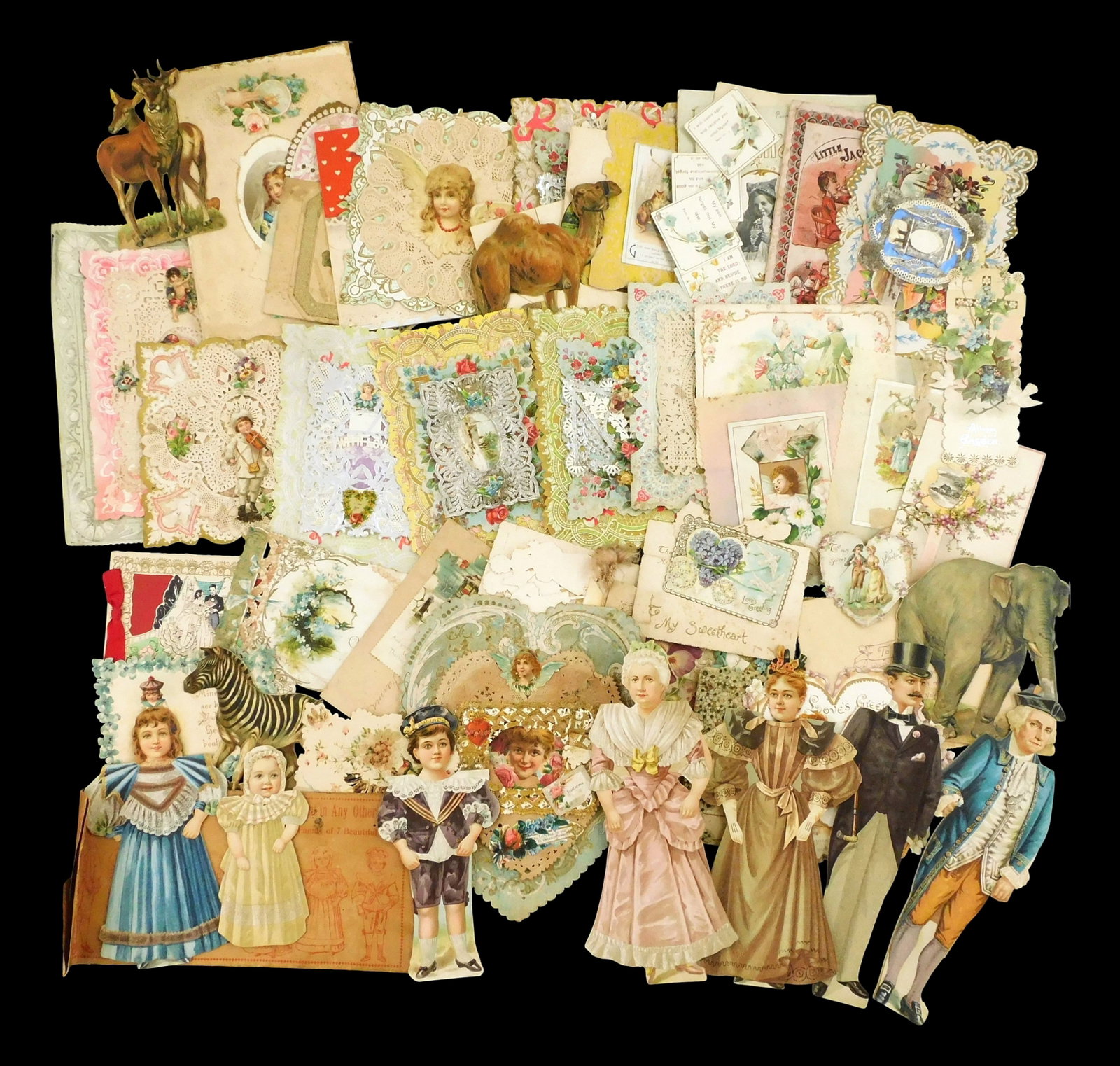 EPHEMERA/ TOYS: 19th C. die cut doll set and 30+ valentines, details include: dolls likely Mc: EPHEMERA/ TOYS: 19th C. die cut doll set and 30+ valentines, details include: dolls likely Mc Laughlin & Co., with envelope titled "A Family of 7 Beautiful Dolls", set of seven with mother, father, th
