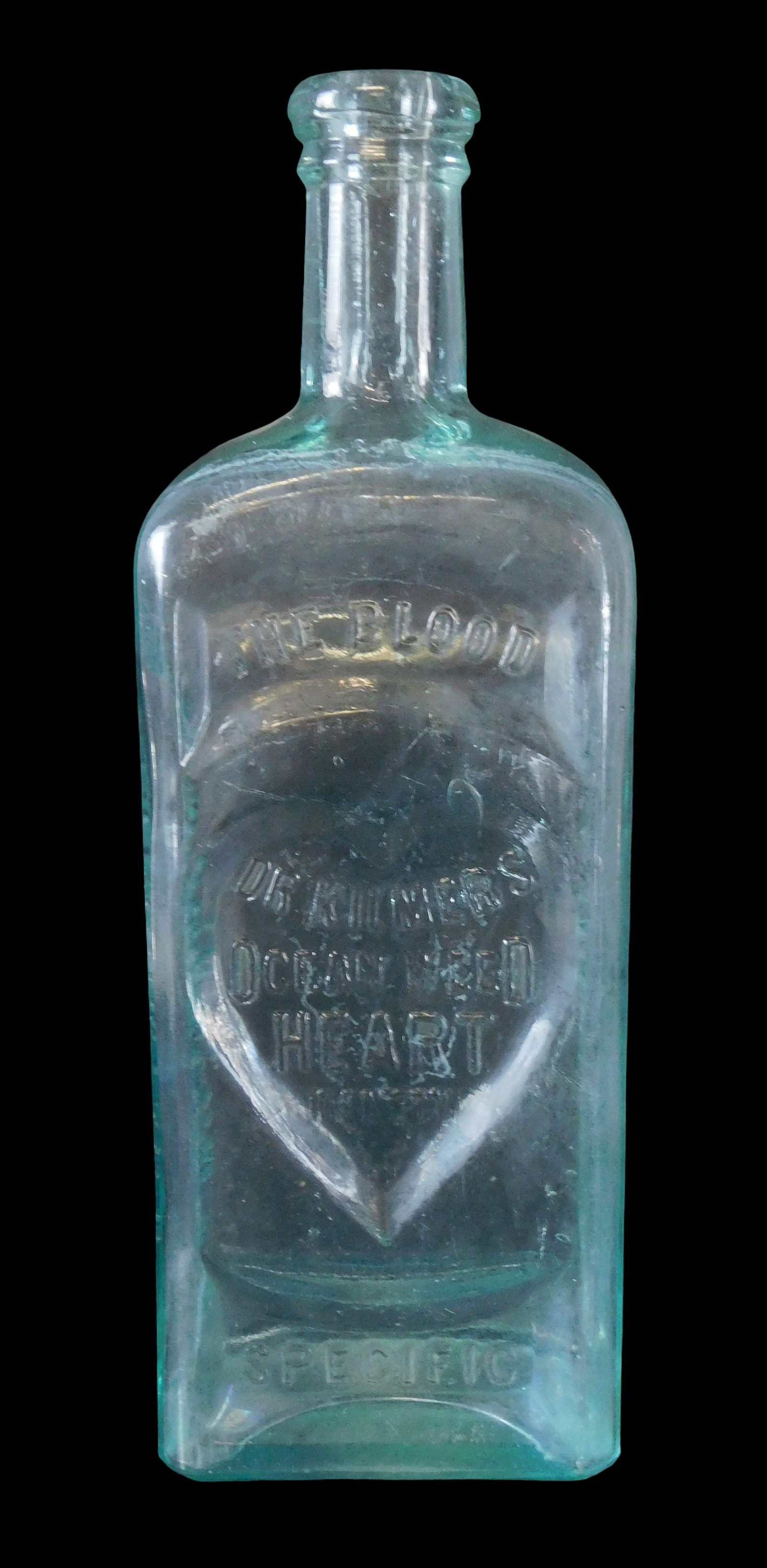 GLASS: Dr. Kilmer's. "Ocean Weed Heart Remedy" embossed advertising bottle, late 19th C., aquamarine (1 of 4)