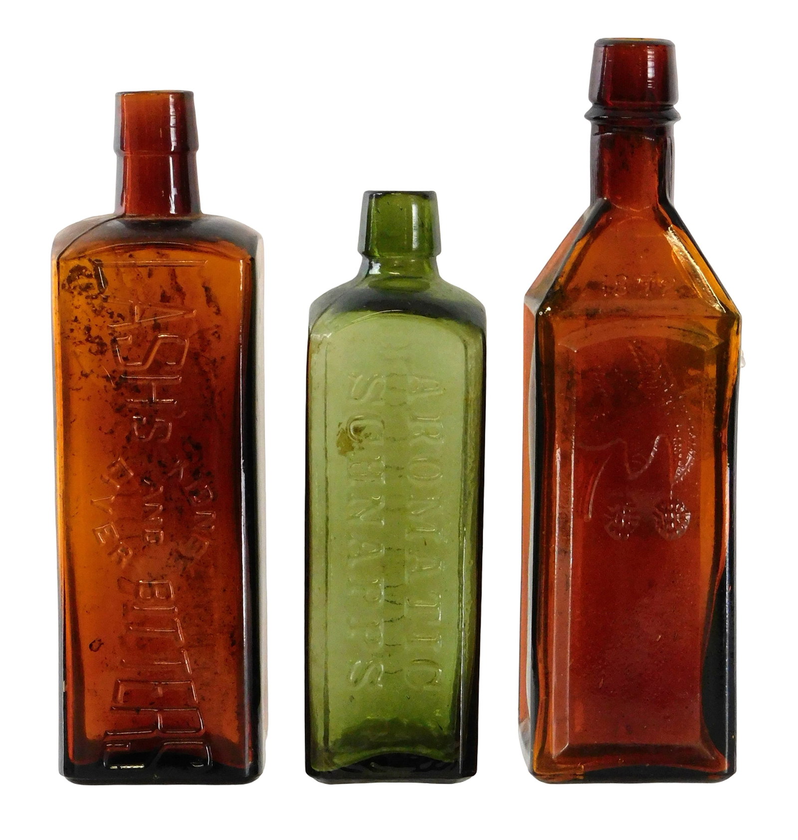 GLASS: Two amber bitters and an aromatic schnapps bottle, late 19th- early 20th C., American, (1 of 4)